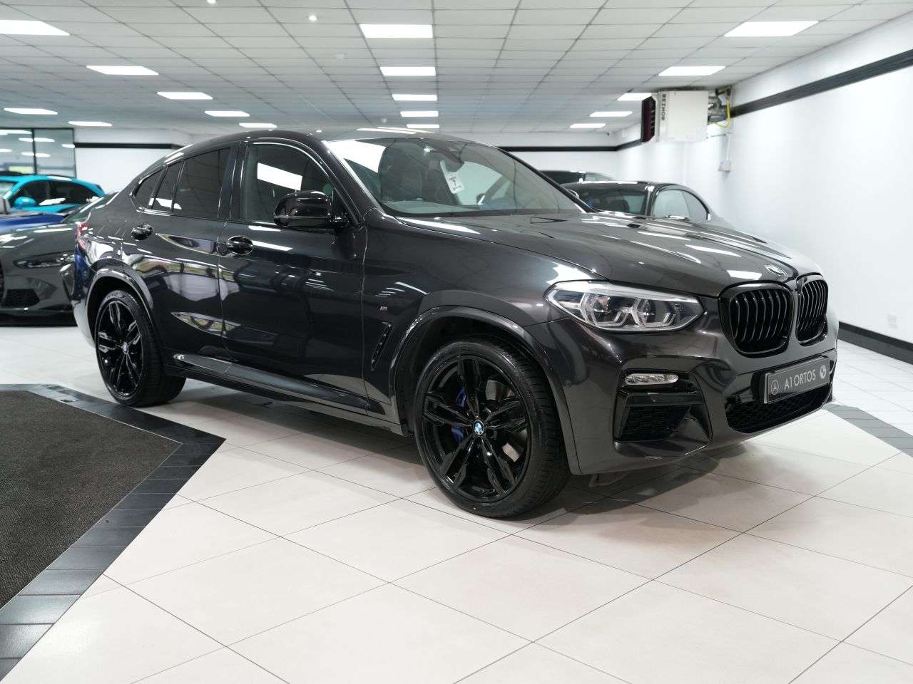 A 2019 BMW X4 3.0 M40i SUV 5dr Petrol Auto xDrive Euro 6 (s/s) (354 ps) STUNNING PX EXAMP A 2019 BMW X4 3.0 M40i SUV 5dr Petrol Auto xDrive Euro 6 (s/s) (354 ps) STUNNING PX EXAMP