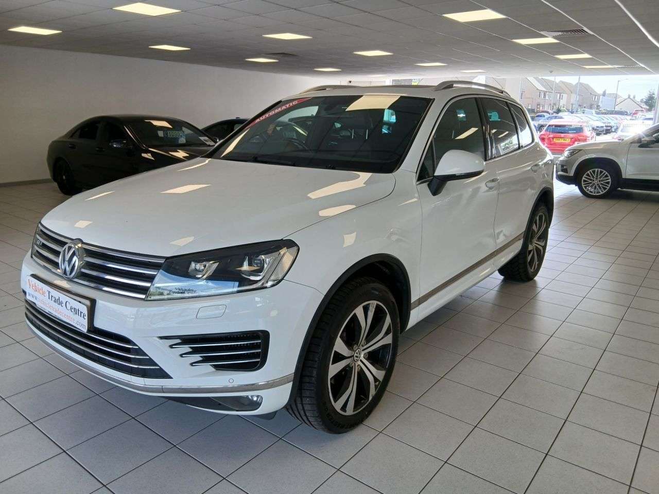 A 2015 VOLKSWAGEN TOUAREG 3.0 TDI V6 BlueMotion Tech R-Line SUV 5dr Diesel Tiptronic 4WD Euro 6 (s/s) A 2015 VOLKSWAGEN TOUAREG 3.0 TDI V6 BlueMotion Tech R-Line SUV 5dr Diesel Tiptronic 4WD Euro 6 (s/s)