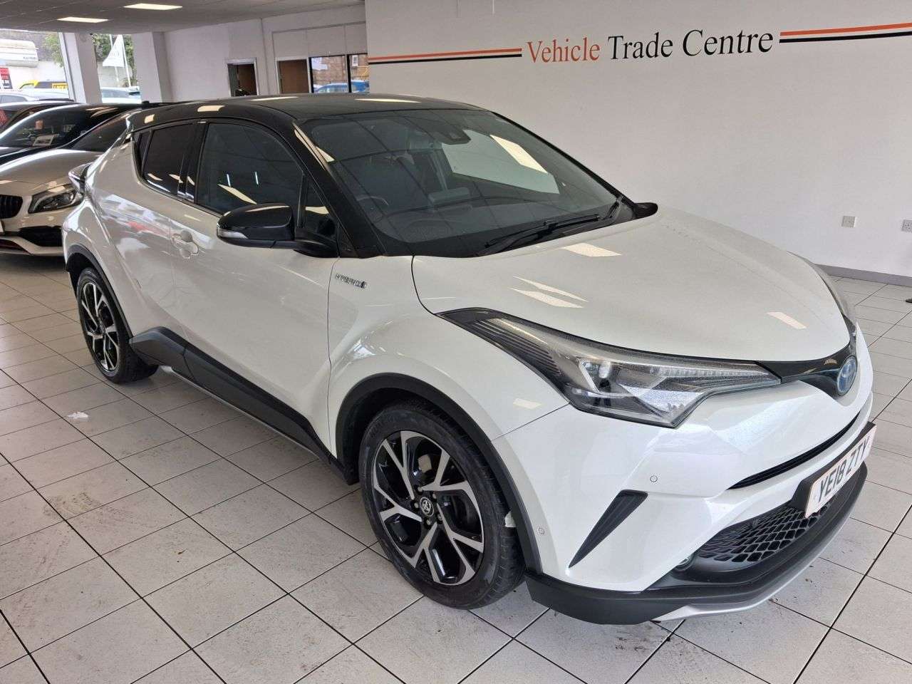 A 2018 TOYOTA C-HR 1.8 VVT-h Dynamic SUV 5dr Petrol Hybrid CVT Euro 6 (s/s) (122 ps) A 2018 TOYOTA C-HR 1.8 VVT-h Dynamic SUV 5dr Petrol Hybrid CVT Euro 6 (s/s) (122 ps)