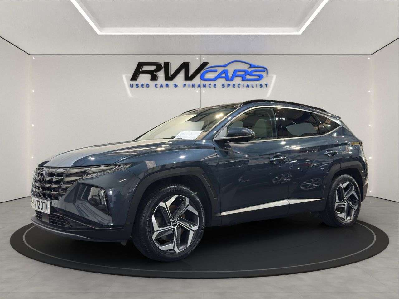A 2023 HYUNDAI TUCSON 1.6 h T-GDi 13.8kWh Ultimate SUV 5dr Petrol Plug-in Hybrid Auto 4WD Euro 6 A 2023 HYUNDAI TUCSON 1.6 h T-GDi 13.8kWh Ultimate SUV 5dr Petrol Plug-in Hybrid Auto 4WD Euro 6