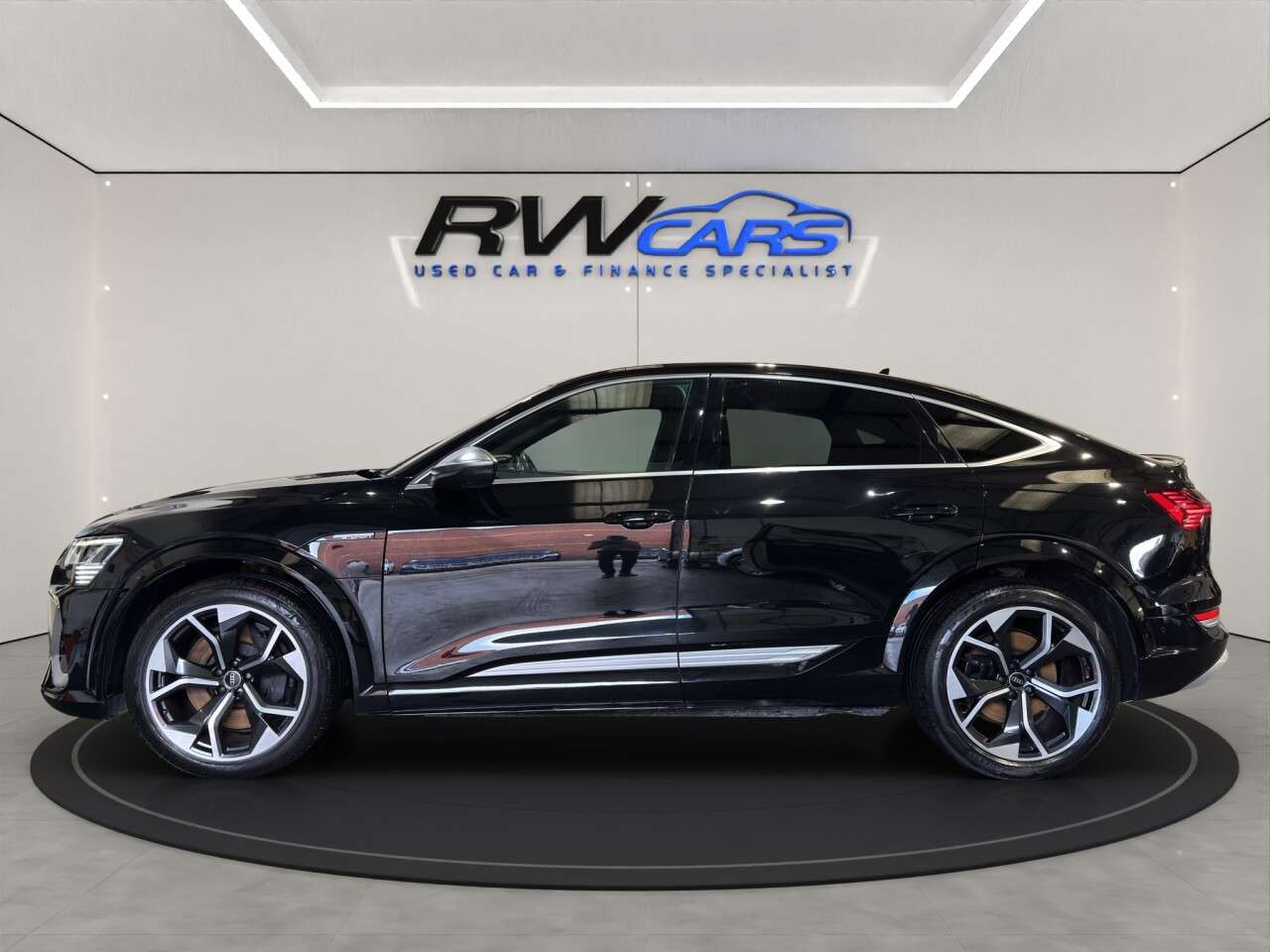 A 2022 AUDI E-TRON S Sportback 5dr Electric Auto quattro 95kWh (11kW Charger) (503 ps) A 2022 AUDI E-TRON S Sportback 5dr Electric Auto quattro 95kWh (11kW Charger) (503 ps)