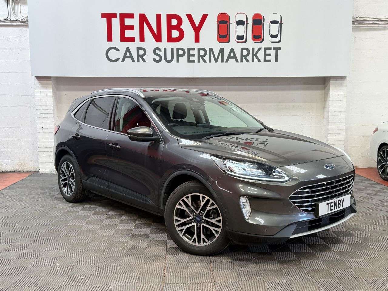 A 2021 FORD KUGA 2.5 EcoBoost Duratec 14.4kWh Titanium First Edition SUV 5dr Petrol Plug-in A 2021 FORD KUGA 2.5 EcoBoost Duratec 14.4kWh Titanium First Edition SUV 5dr Petrol Plug-in