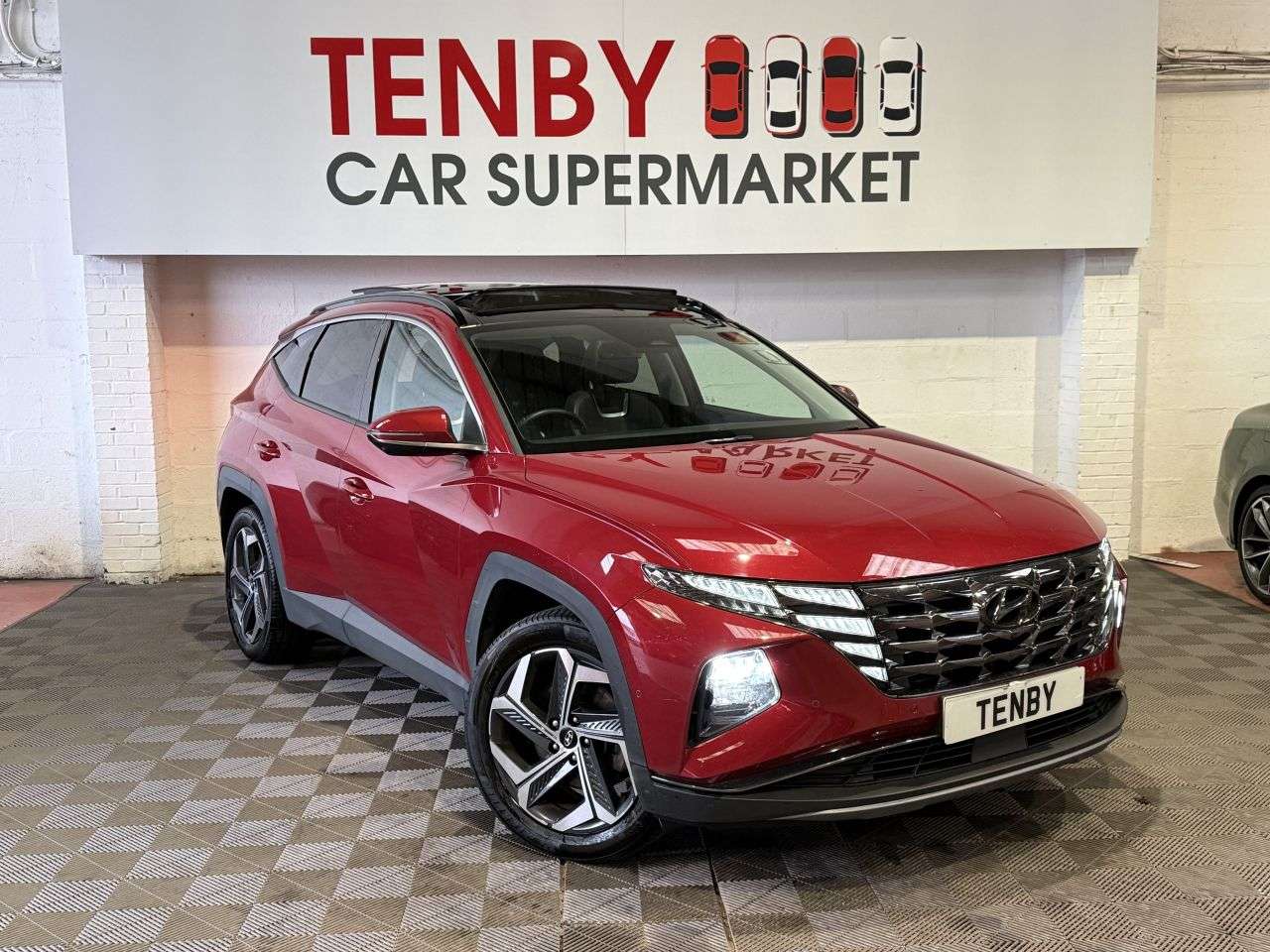 A 2021 HYUNDAI TUCSON 1.6 h T-GDi Ultimate SUV 5dr Petrol Hybrid Auto Euro 6 (s/s) (230 ps) DIGID A 2021 HYUNDAI TUCSON 1.6 h T-GDi Ultimate SUV 5dr Petrol Hybrid Auto Euro 6 (s/s) (230 ps) DIGID