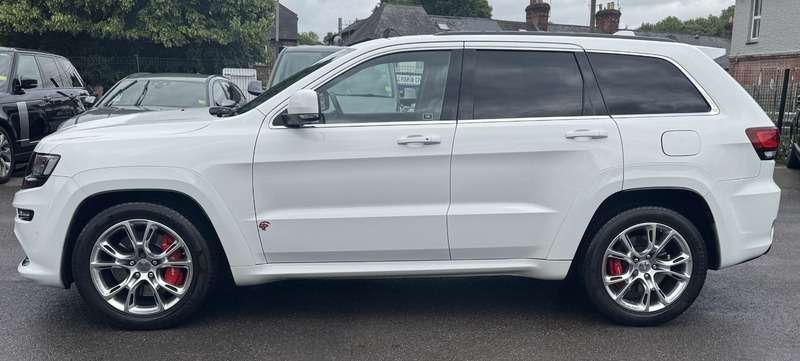 A 2014 JEEP GRAND CHEROKEE 6.4 SRT SUV 5dr Petrol Auto 4WD Euro 6 (461 bhp) A 2014 JEEP GRAND CHEROKEE 6.4 SRT SUV 5dr Petrol Auto 4WD Euro 6 (461 bhp)
