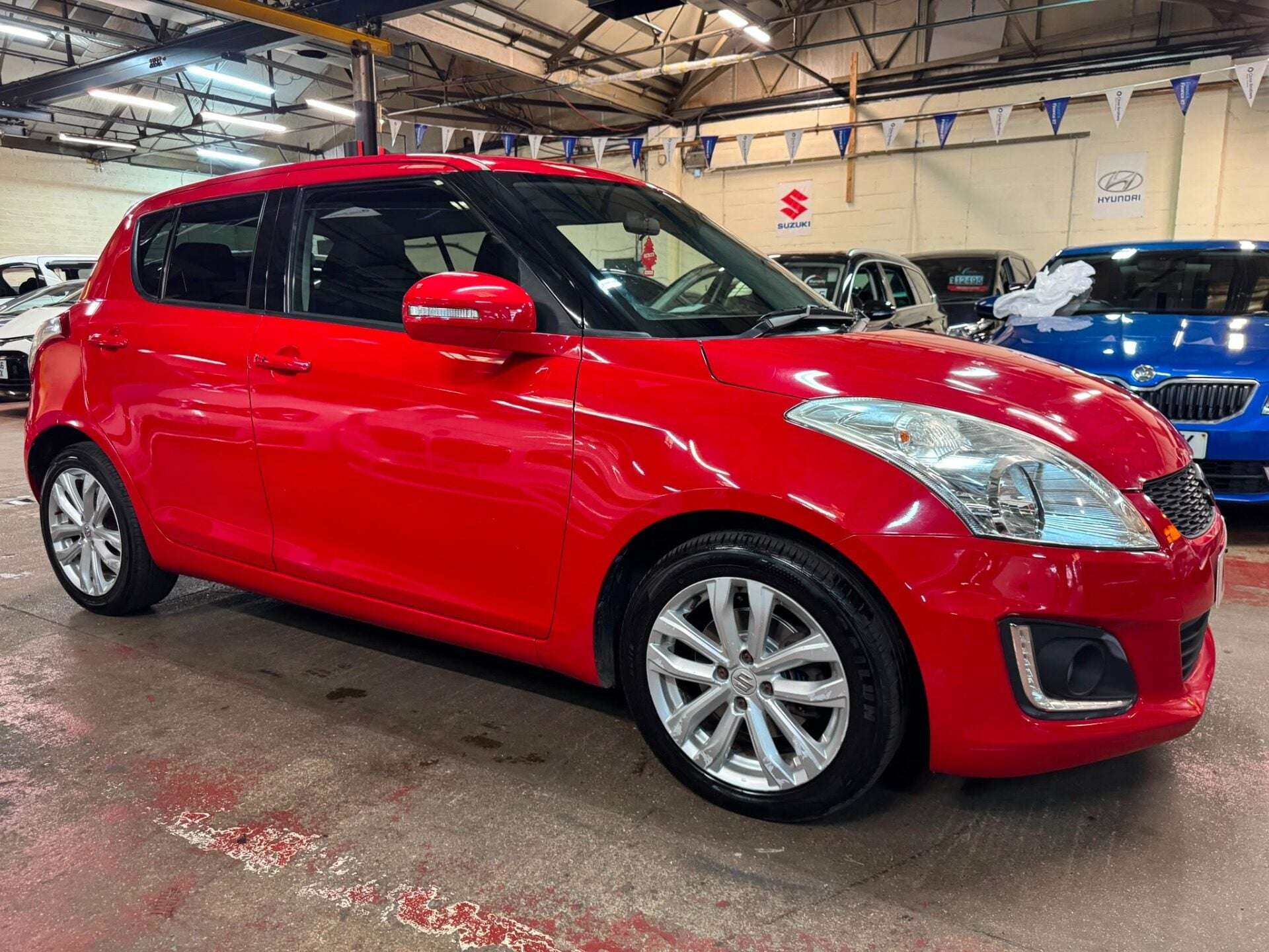 A 2014 SUZUKI SWIFT SZ4 A 2014 SUZUKI SWIFT SZ4