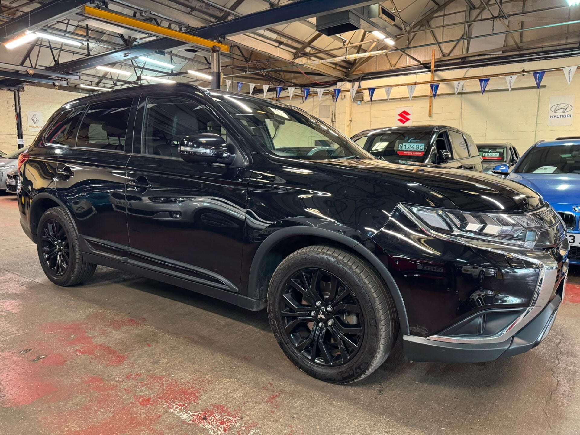 A 2020 MITSUBISHI OUTLANDER BLACK A 2020 MITSUBISHI OUTLANDER BLACK