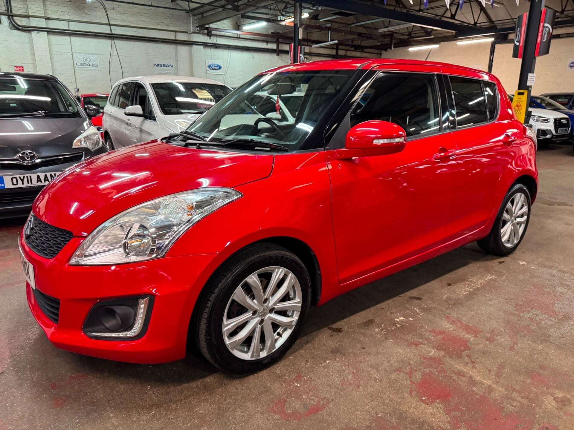 A 2014 SUZUKI SWIFT SZ4 A 2014 SUZUKI SWIFT SZ4