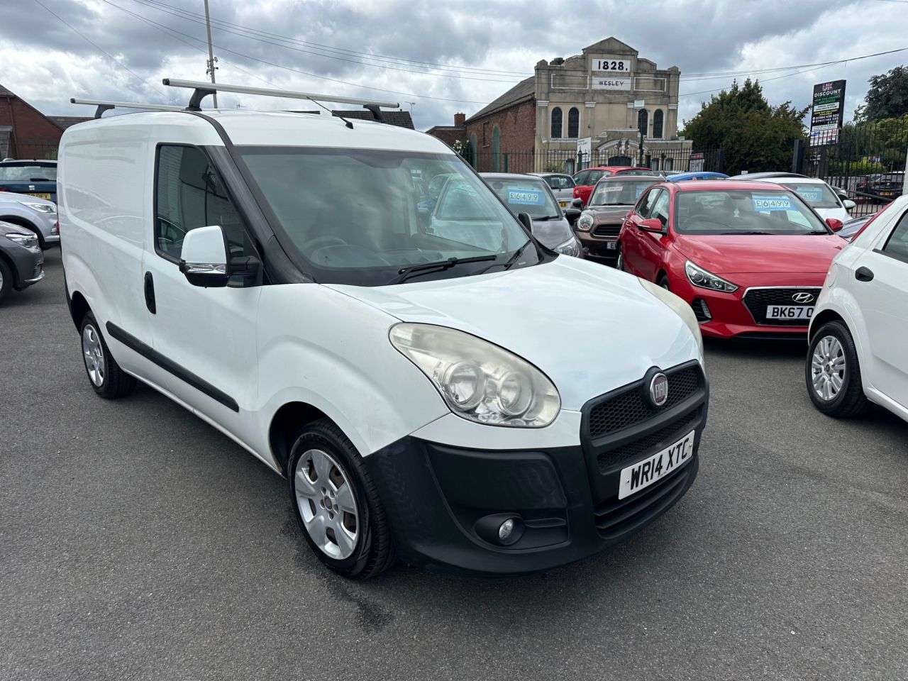 A 2014 FIAT DOBLO 1.3 JTD MultiJetII 16v SX Tecnico Panel Van 4dr Diesel Manual L1 H1 (126 g/ A 2014 FIAT DOBLO 1.3 JTD MultiJetII 16v SX Tecnico Panel Van 4dr Diesel Manual L1 H1 (126 g/