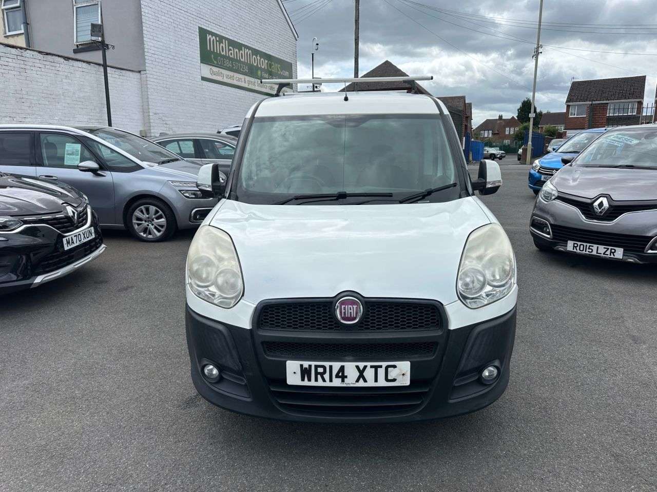 A 2014 FIAT DOBLO 1.3 JTD MultiJetII 16v SX Tecnico Panel Van 4dr Diesel Manual L1 H1 (126 g/ A 2014 FIAT DOBLO 1.3 JTD MultiJetII 16v SX Tecnico Panel Van 4dr Diesel Manual L1 H1 (126 g/
