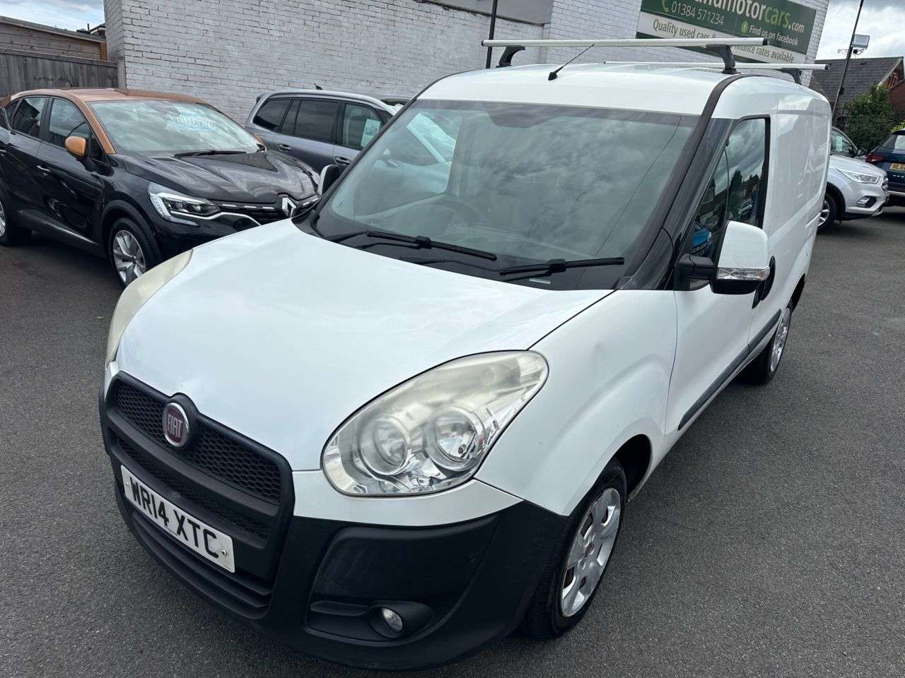 A 2014 FIAT DOBLO 1.3 JTD MultiJetII 16v SX Tecnico Panel Van 4dr Diesel Manual L1 H1 (126 g/ A 2014 FIAT DOBLO 1.3 JTD MultiJetII 16v SX Tecnico Panel Van 4dr Diesel Manual L1 H1 (126 g/