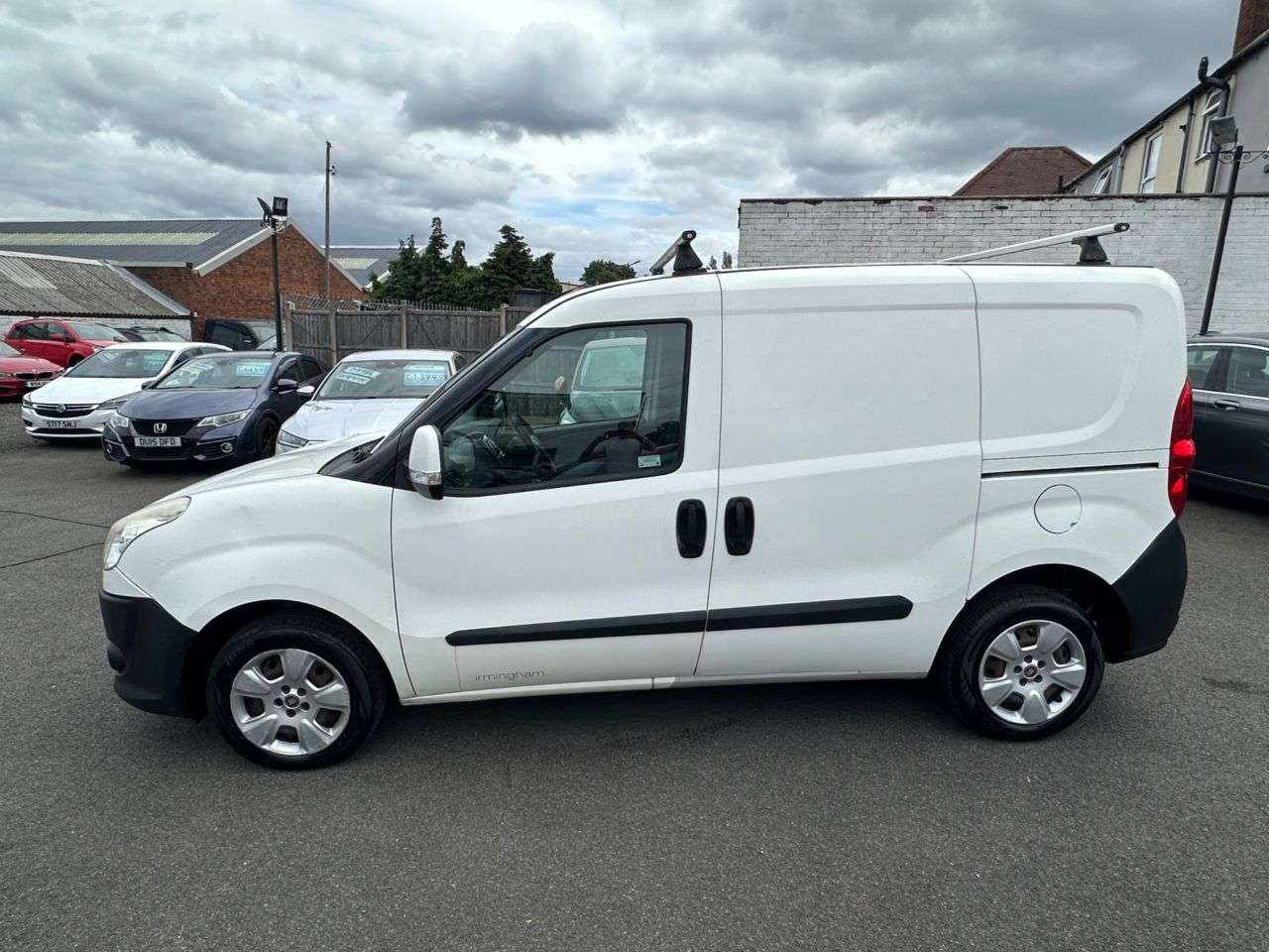 A 2014 FIAT DOBLO 1.3 JTD MultiJetII 16v SX Tecnico Panel Van 4dr Diesel Manual L1 H1 (126 g/ A 2014 FIAT DOBLO 1.3 JTD MultiJetII 16v SX Tecnico Panel Van 4dr Diesel Manual L1 H1 (126 g/