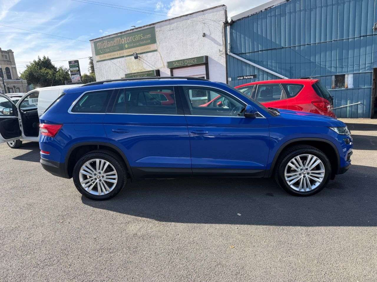 A 2021 SKODA KODIAQ 1.5 TSI ACT SE L SUV 5dr Petrol DSG Euro 6 (s/s) (7 Seat) (150 ps) APPLE/AN A 2021 SKODA KODIAQ 1.5 TSI ACT SE L SUV 5dr Petrol DSG Euro 6 (s/s) (7 Seat) (150 ps) APPLE/AN