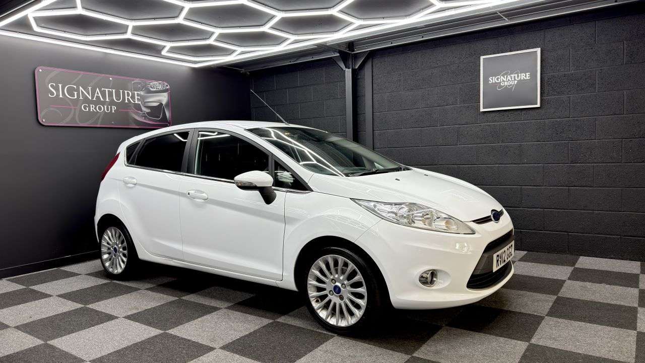 A 2012 FORD FIESTA 1.4 Titanium Hatchback 5dr Petrol Manual (133 g/km, 94 bhp) 5 Door Titanium A 2012 FORD FIESTA 1.4 Titanium Hatchback 5dr Petrol Manual (133 g/km, 94 bhp) 5 Door Titanium