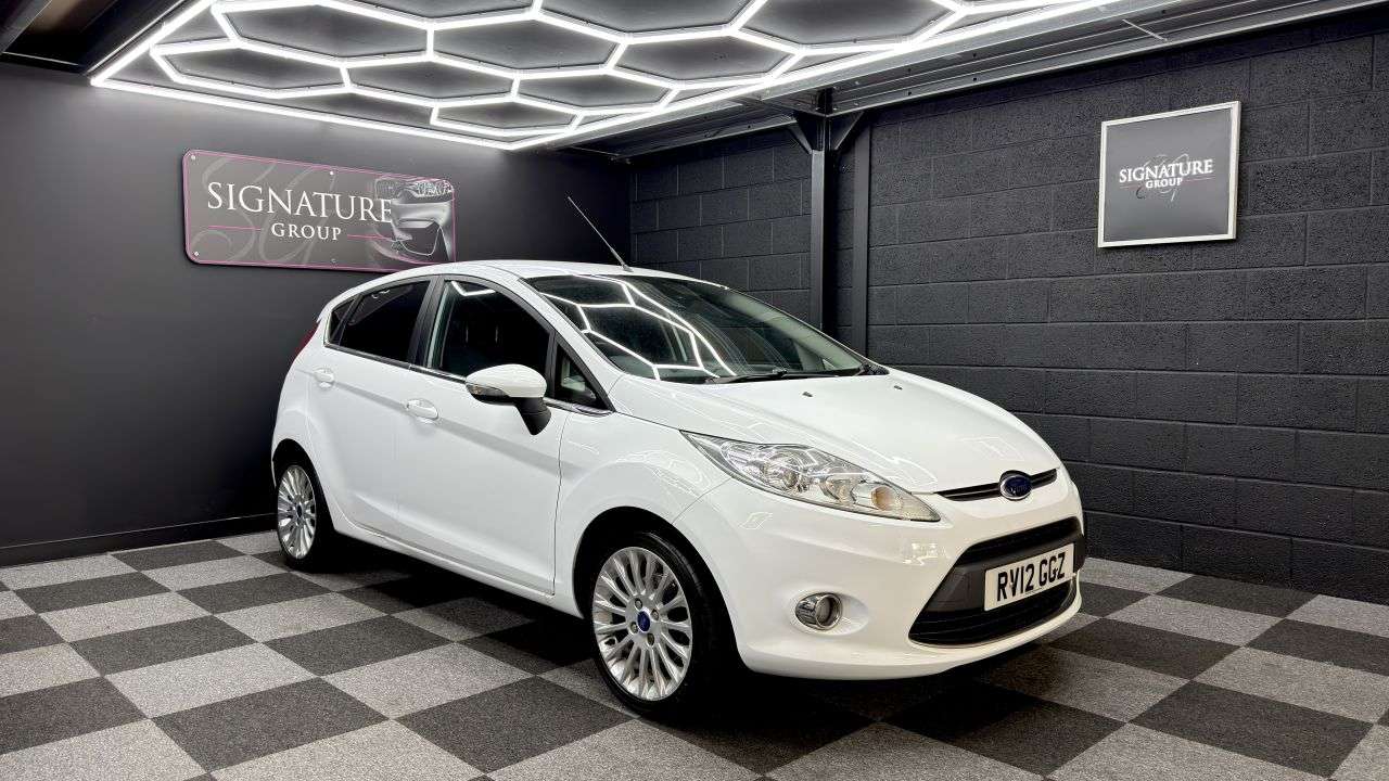 A 2012 FORD FIESTA 1.4 Titanium Hatchback 5dr Petrol Manual (133 g/km, 94 bhp) 5 Door Titanium A 2012 FORD FIESTA 1.4 Titanium Hatchback 5dr Petrol Manual (133 g/km, 94 bhp) 5 Door Titanium