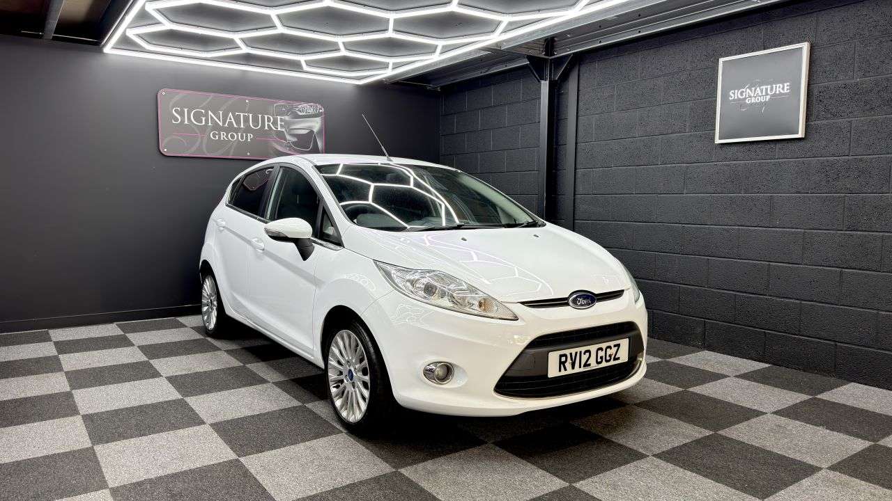 A 2012 FORD FIESTA 1.4 Titanium Hatchback 5dr Petrol Manual (133 g/km, 94 bhp) 5 Door Titanium A 2012 FORD FIESTA 1.4 Titanium Hatchback 5dr Petrol Manual (133 g/km, 94 bhp) 5 Door Titanium