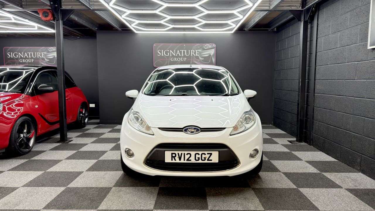 A 2012 FORD FIESTA 1.4 Titanium Hatchback 5dr Petrol Manual (133 g/km, 94 bhp) 5 Door Titanium A 2012 FORD FIESTA 1.4 Titanium Hatchback 5dr Petrol Manual (133 g/km, 94 bhp) 5 Door Titanium