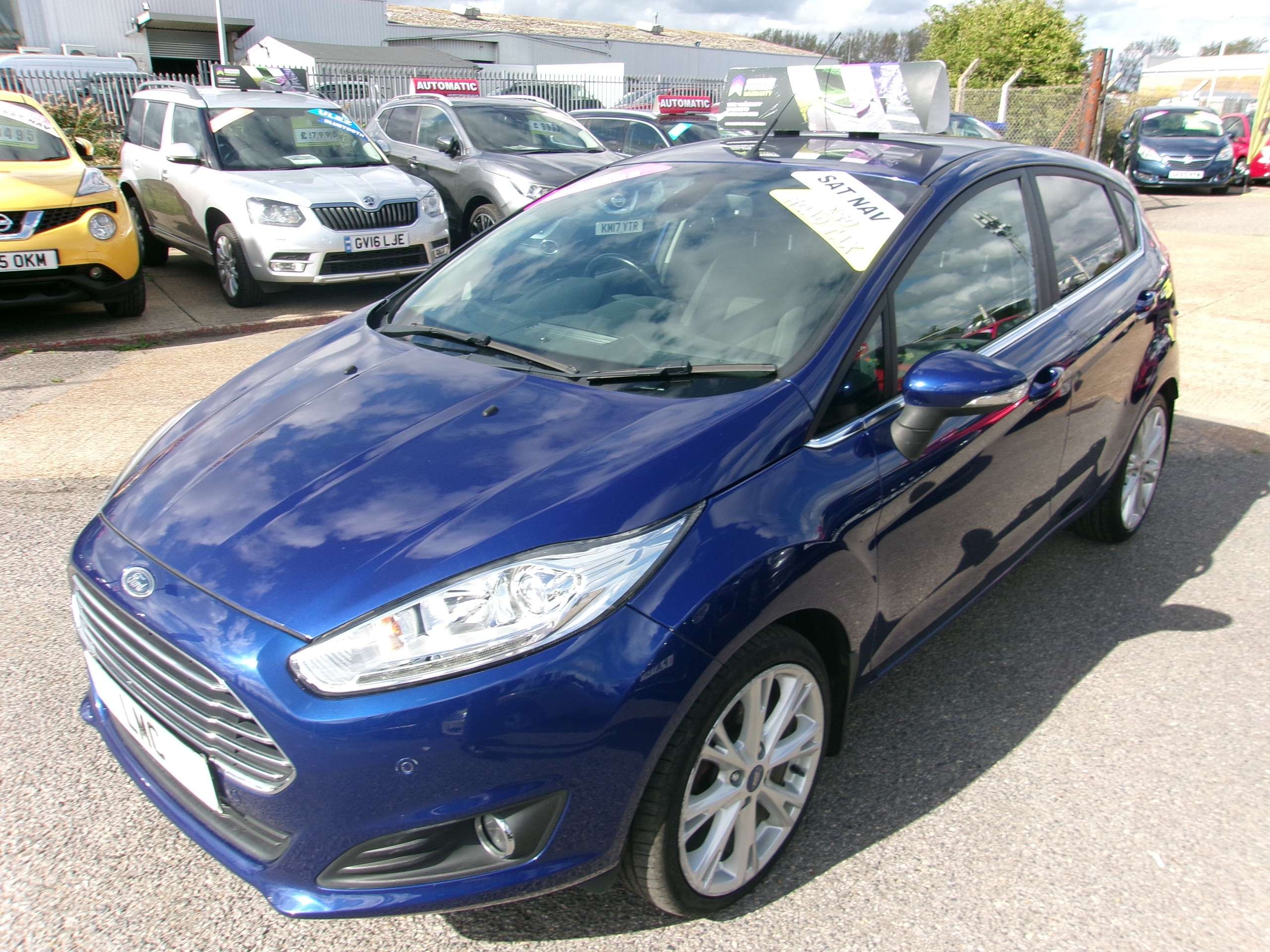 A 2016 FORD FIESTA 1.0T EcoBoost Titanium Hatchback 5dr Petrol Manual Euro 6 (s/s) (100 ps) A 2016 FORD FIESTA 1.0T EcoBoost Titanium Hatchback 5dr Petrol Manual Euro 6 (s/s) (100 ps)