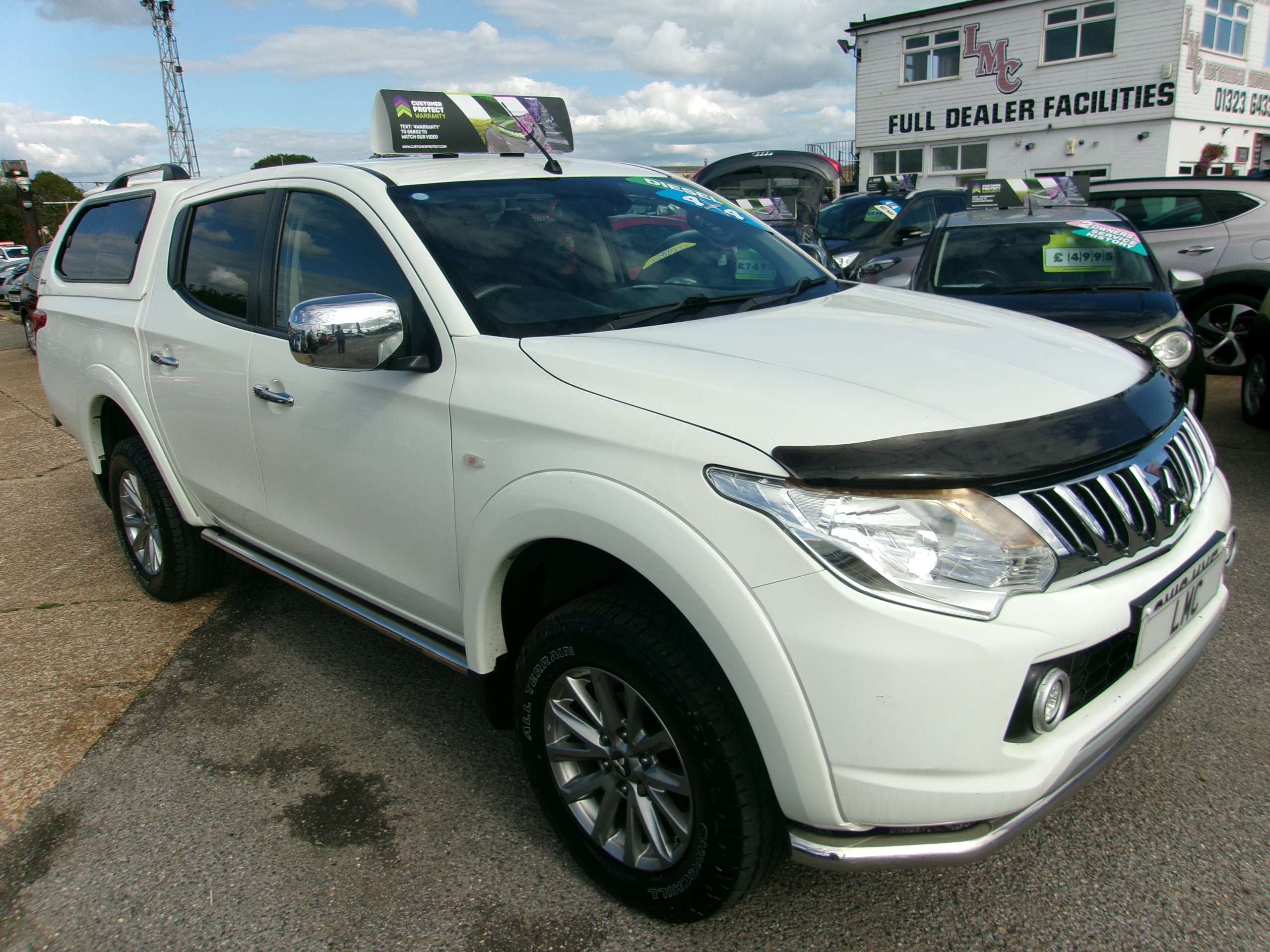 A 2016 MITSUBISHI L200 2.4 DI-D DC Titan Pickup Double Cab 4dr Diesel Manual 4WD Euro 5 (178 ps) A 2016 MITSUBISHI L200 2.4 DI-D DC Titan Pickup Double Cab 4dr Diesel Manual 4WD Euro 5 (178 ps)