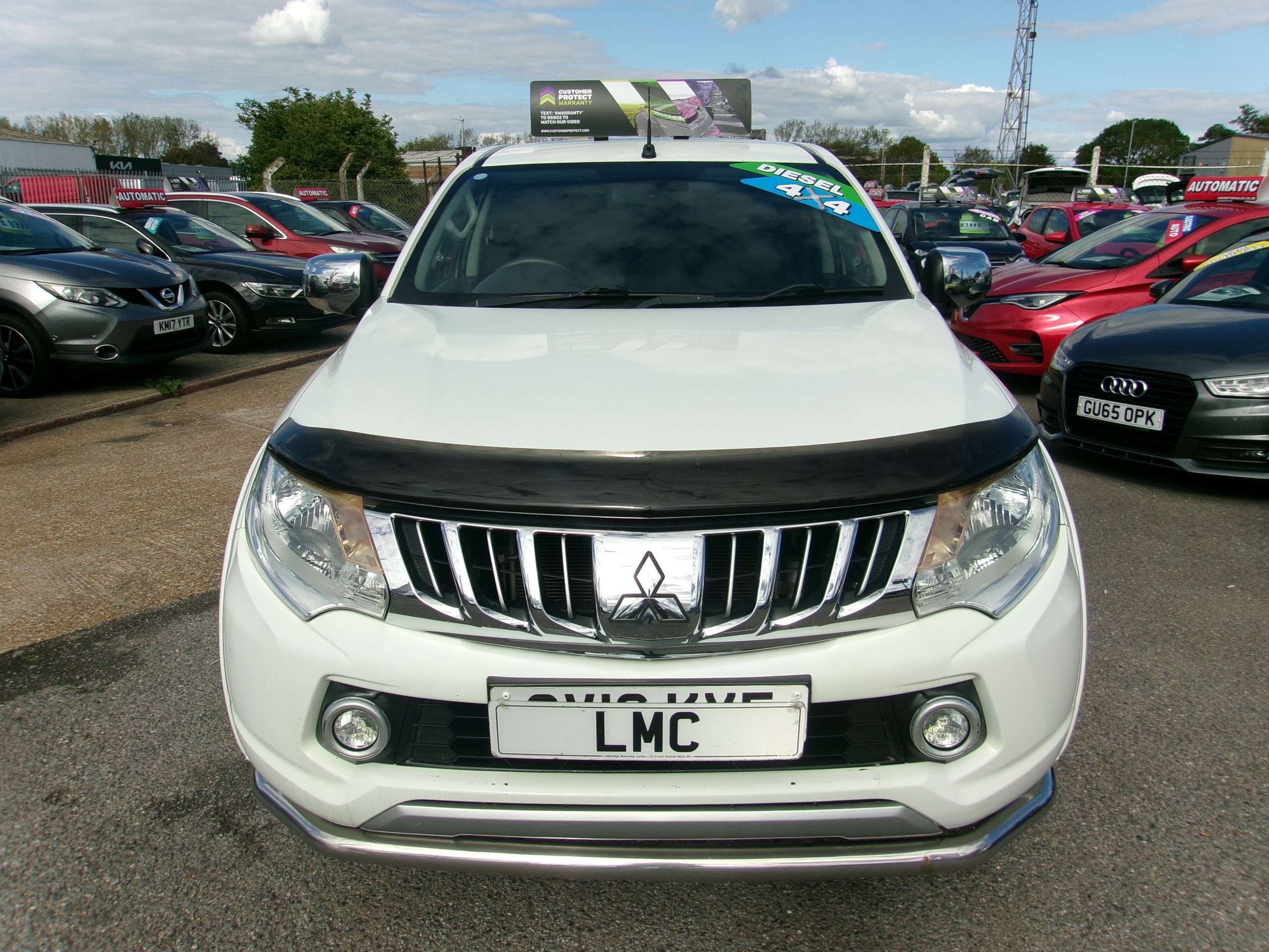 A 2016 MITSUBISHI L200 2.4 DI-D DC Titan Pickup Double Cab 4dr Diesel Manual 4WD Euro 5 (178 ps) A 2016 MITSUBISHI L200 2.4 DI-D DC Titan Pickup Double Cab 4dr Diesel Manual 4WD Euro 5 (178 ps)