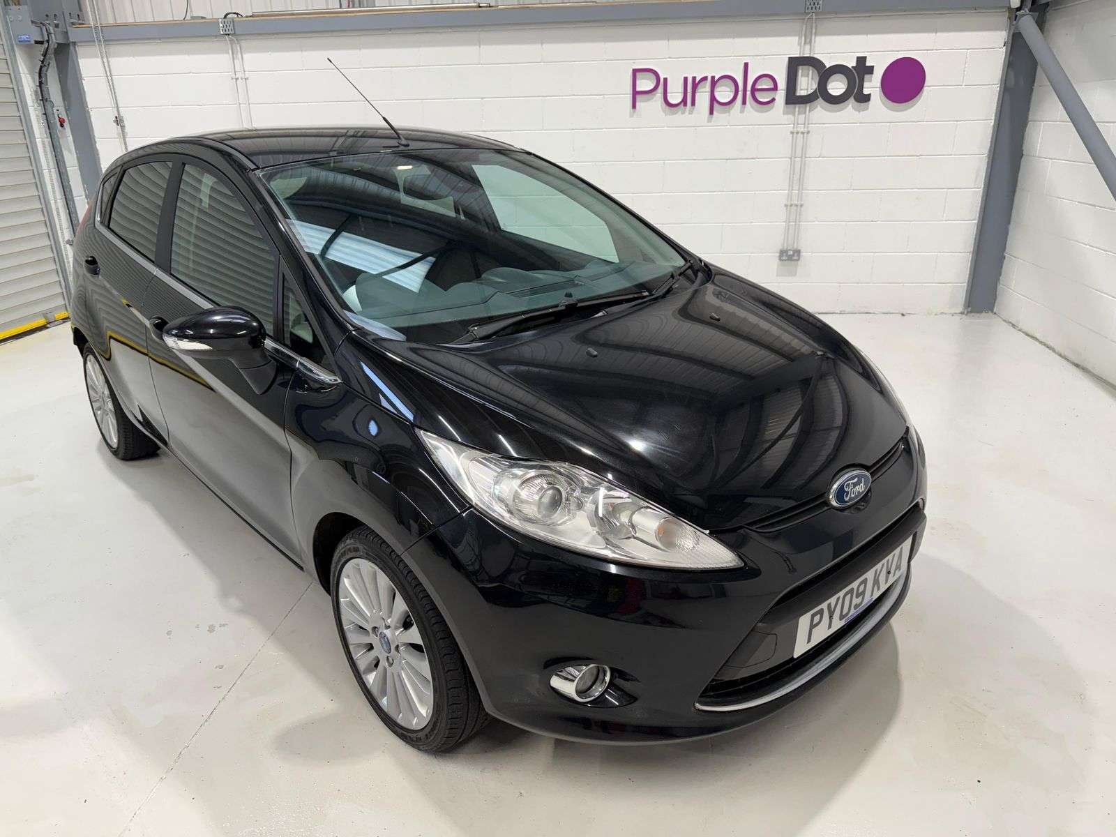 A 2009 FORD FIESTA 1.4 Titanium Hatchback 5dr Petrol Manual (133 g/km, 94 bhp) A 2009 FORD FIESTA 1.4 Titanium Hatchback 5dr Petrol Manual (133 g/km, 94 bhp)
