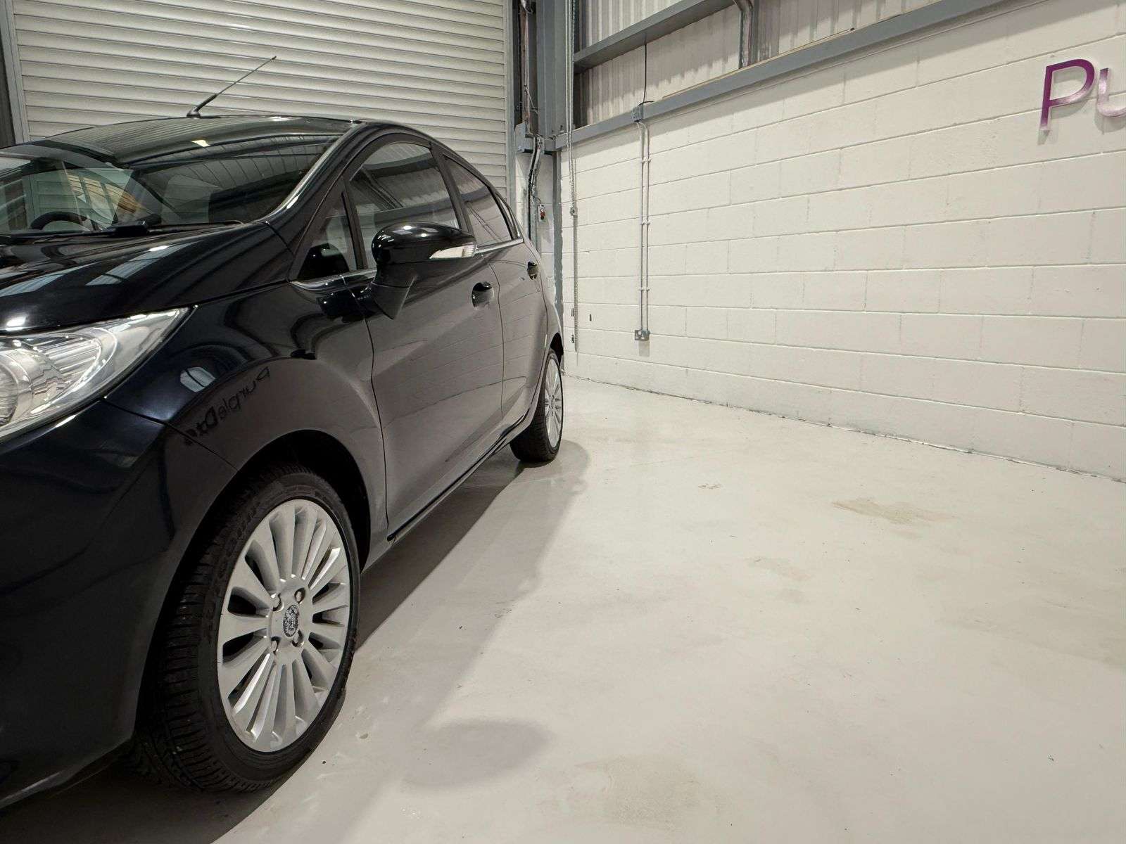 A 2009 FORD FIESTA 1.4 Titanium Hatchback 5dr Petrol Manual (133 g/km, 94 bhp) A 2009 FORD FIESTA 1.4 Titanium Hatchback 5dr Petrol Manual (133 g/km, 94 bhp)