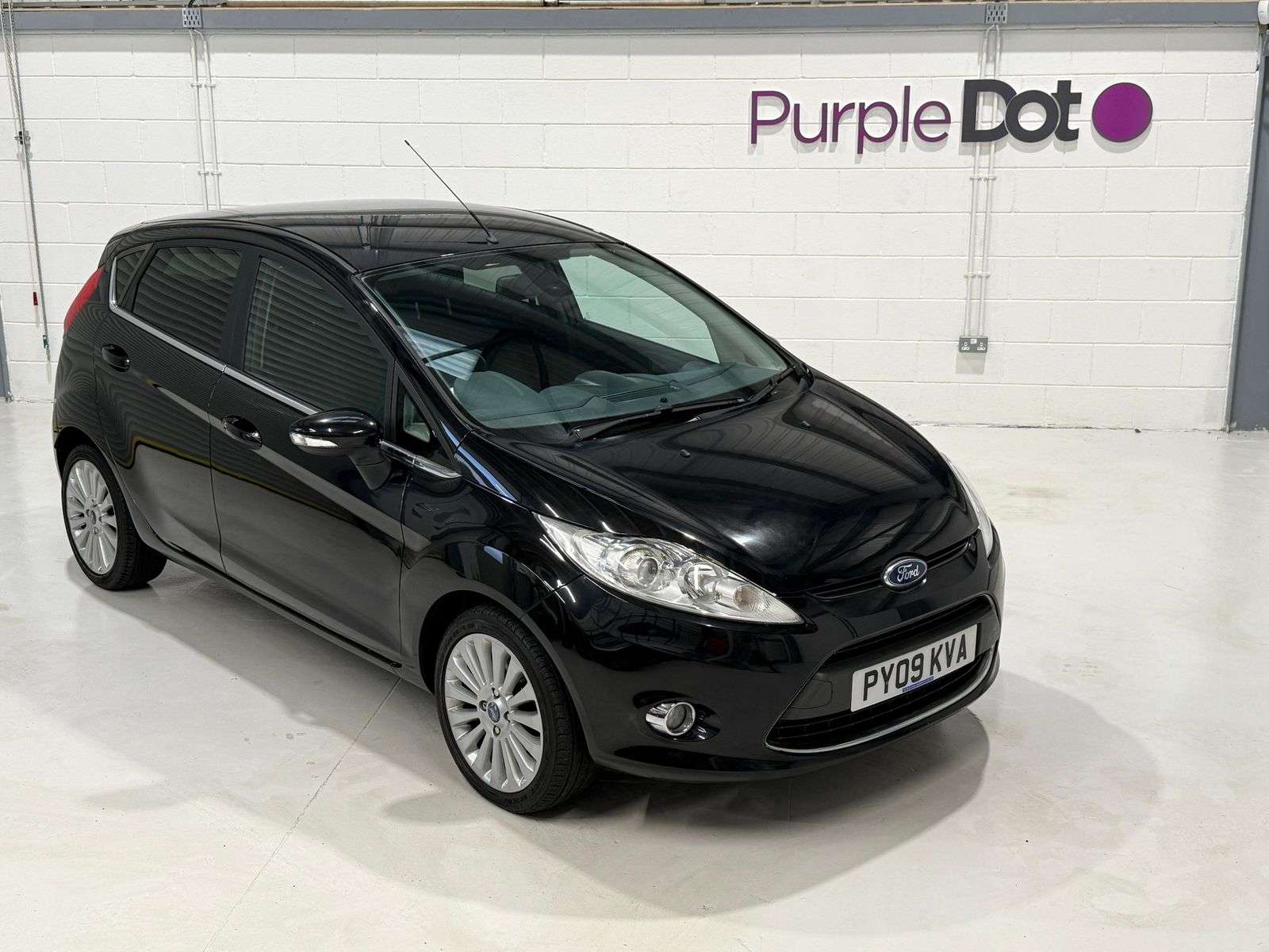 A 2009 FORD FIESTA 1.4 Titanium Hatchback 5dr Petrol Manual (133 g/km, 94 bhp) A 2009 FORD FIESTA 1.4 Titanium Hatchback 5dr Petrol Manual (133 g/km, 94 bhp)