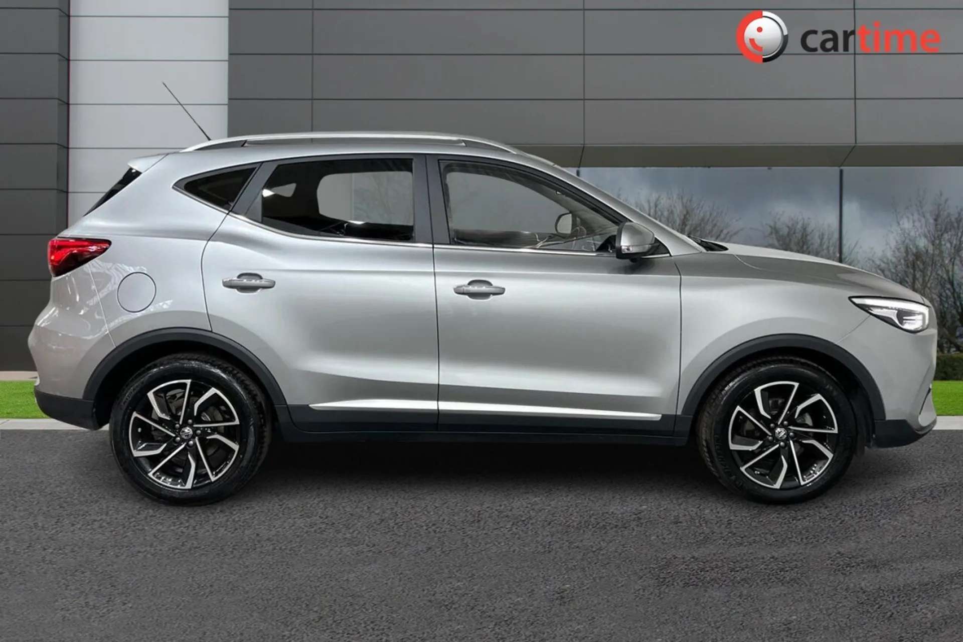 A 2023 MG MG ZS 1.0 EXCLUSIVE T-GDI 5d 110 BHP Heated Seats, 10-Inch Touchscreen, Blind Spot Monitoring, 360 Degree Camera, Keyless Entry Monument Silver, 17-Inch All A 2023 MG MG ZS 1.0 EXCLUSIVE T-GDI 5d 110 BHP Heated Seats, 10-Inch Touchscreen, Blind Spot Monitoring, 360 Degree Camera, Keyless Entry Monument Silver, 17-Inch All