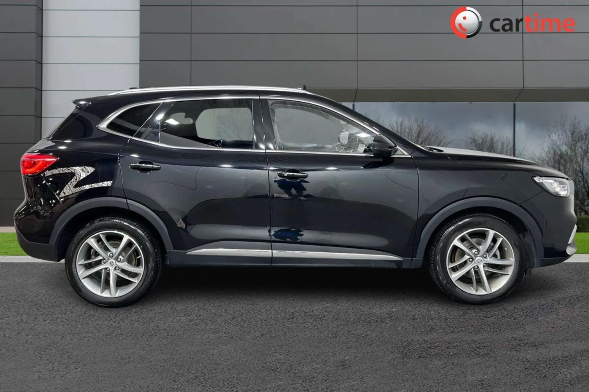 A 2022 MG MG HS 1.5 EXCLUSIVE DCT 5d 160 BHP Heated Seats, Power Tailgate, Adaptive Cruise Control, Rear View Camera, 10-Inch Touchscreen Black Pearl, 18-Inch Alloy W A 2022 MG MG HS 1.5 EXCLUSIVE DCT 5d 160 BHP Heated Seats, Power Tailgate, Adaptive Cruise Control, Rear View Camera, 10-Inch Touchscreen Black Pearl, 18-Inch Alloy W