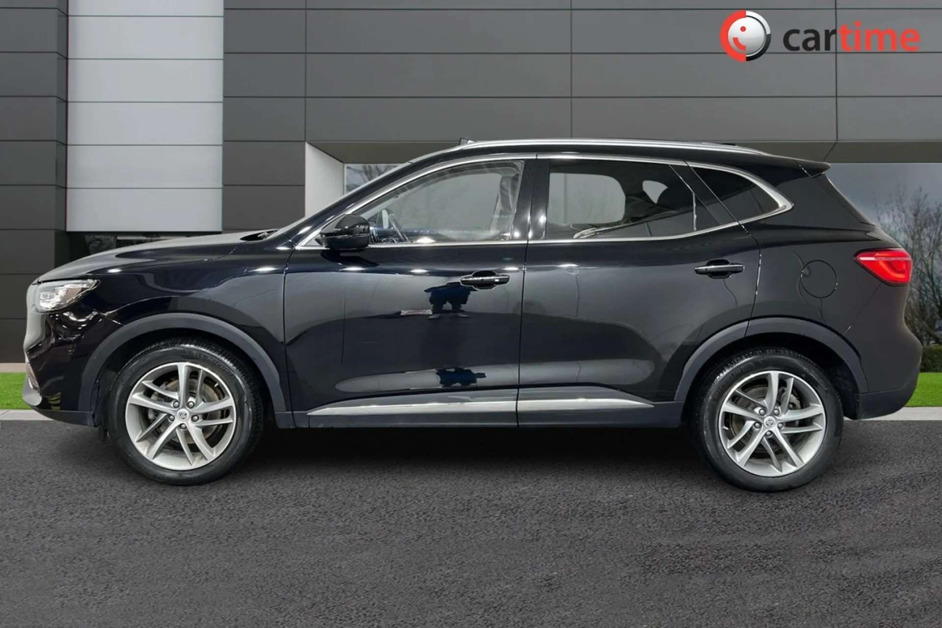 A 2022 MG MG HS 1.5 EXCLUSIVE DCT 5d 160 BHP Heated Seats, Power Tailgate, Adaptive Cruise Control, Rear View Camera, 10-Inch Touchscreen Black Pearl, 18-Inch Alloy W A 2022 MG MG HS 1.5 EXCLUSIVE DCT 5d 160 BHP Heated Seats, Power Tailgate, Adaptive Cruise Control, Rear View Camera, 10-Inch Touchscreen Black Pearl, 18-Inch Alloy W