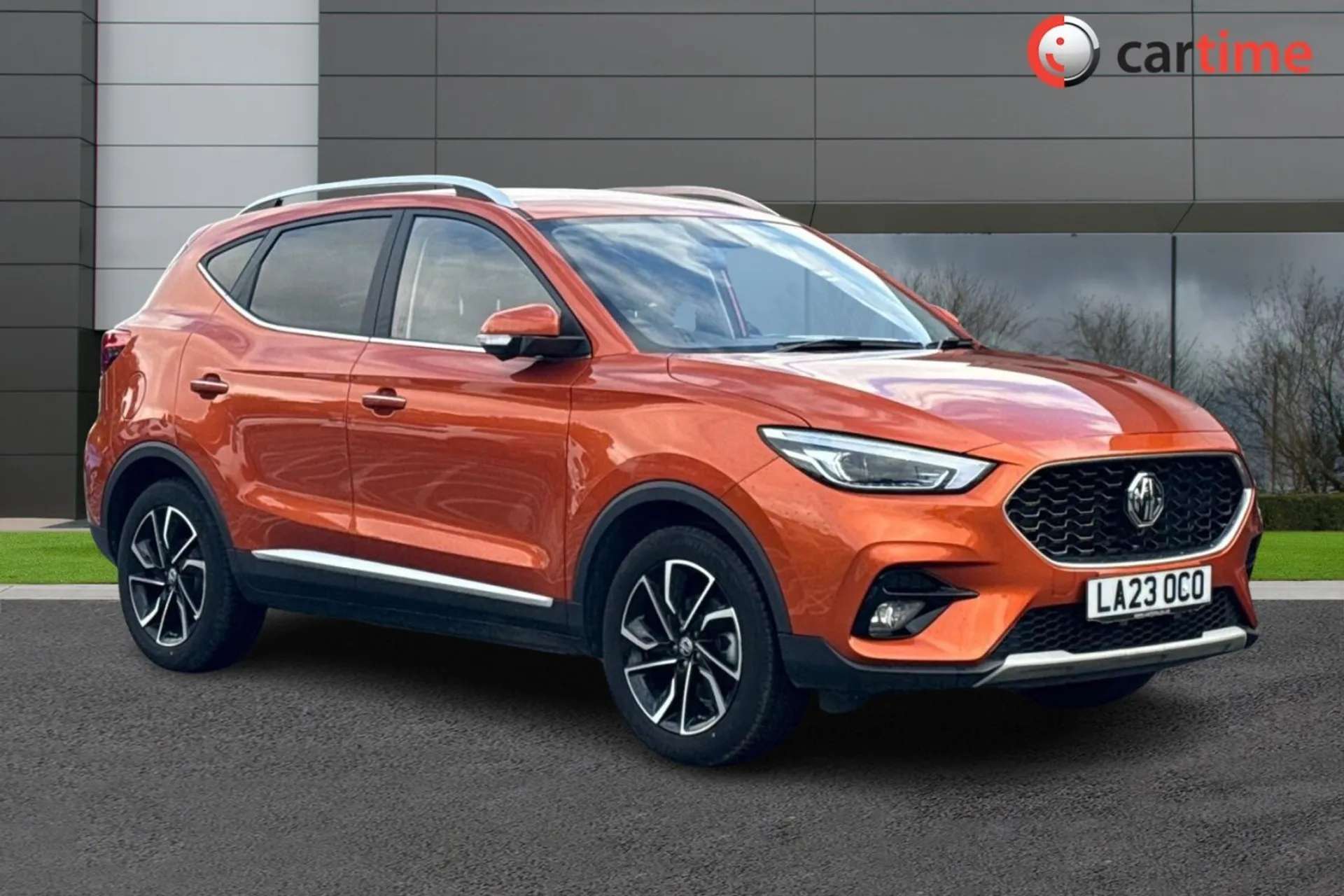 A 2023 MG MG ZS 1.5 EXCLUSIVE VTI-TECH 5d 105 BHP 360 Camera, 10-Inch Touchscreen, Heated Front Seats, Satellite Navigation, USB Mobile Charging Hoxton Orange, 17-Inc A 2023 MG MG ZS 1.5 EXCLUSIVE VTI-TECH 5d 105 BHP 360 Camera, 10-Inch Touchscreen, Heated Front Seats, Satellite Navigation, USB Mobile Charging Hoxton Orange, 17-Inc