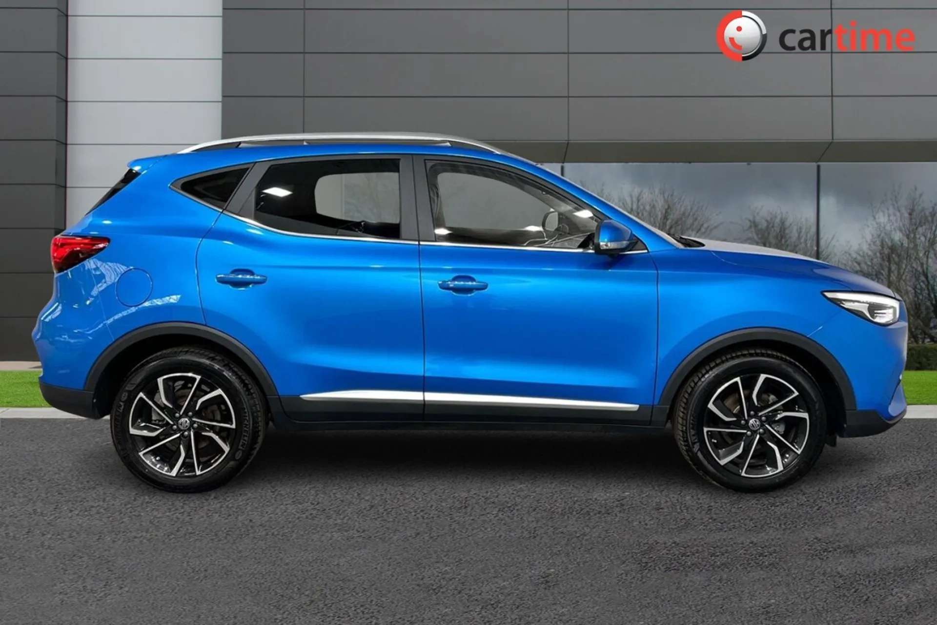 A 2023 MG MG ZS 1.0 EXCLUSIVE T-GDI 5d 110 BHP Heated Seats, 10-Inch Touchscreen, Blind Spot Monitoring, 360 Degree Camera, Keyless Entry Battersea Blue, 17-Inch Allo A 2023 MG MG ZS 1.0 EXCLUSIVE T-GDI 5d 110 BHP Heated Seats, 10-Inch Touchscreen, Blind Spot Monitoring, 360 Degree Camera, Keyless Entry Battersea Blue, 17-Inch Allo