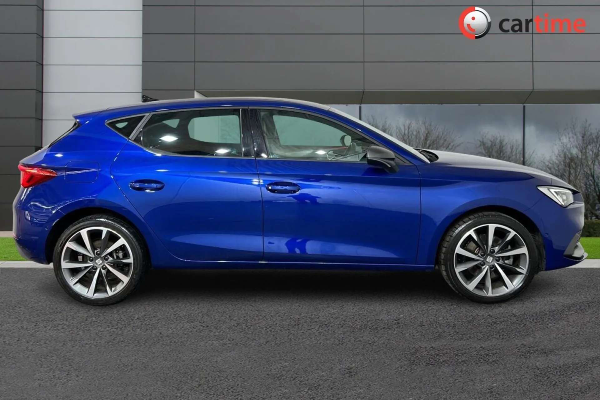 A 2021 SEAT LEON 1.4 FR SPORT DSG 5d 202 BHP Wireless Apple CarPlay, Heated Steering Wheel, Wireless Phone Charging, Digital Cockpit, Tinted Windows Mystery Blue, 18In A 2021 SEAT LEON 1.4 FR SPORT DSG 5d 202 BHP Wireless Apple CarPlay, Heated Steering Wheel, Wireless Phone Charging, Digital Cockpit, Tinted Windows Mystery Blue, 18In