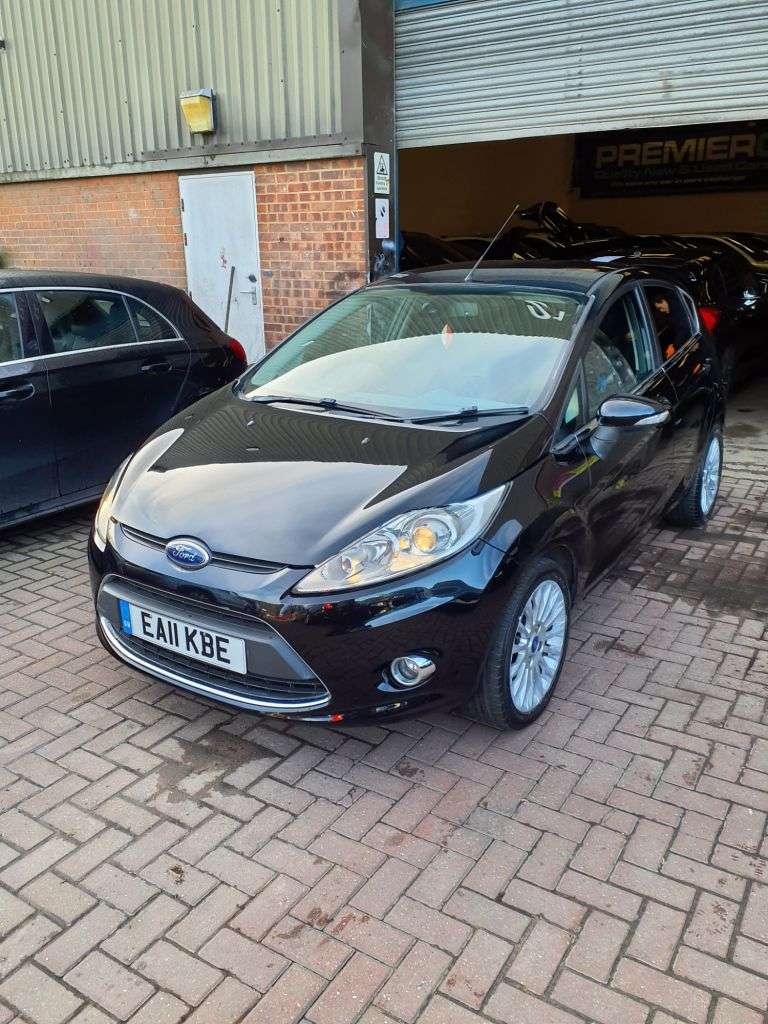 A 2011 FORD FIESTA 1.4 Titanium Hatchback 5dr Petrol Automatic (154 g/km, 94 bhp) AUTO NEW WAT A 2011 FORD FIESTA 1.4 Titanium Hatchback 5dr Petrol Automatic (154 g/km, 94 bhp) AUTO NEW WAT