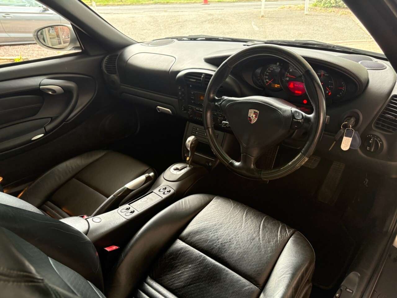 A 2002 PORSCHE 911 3.6 996 Carrera 4S Coupe 2dr Petrol Tiptronic S AWD (294 g/km, 315 bhp) 24 A 2002 PORSCHE 911 3.6 996 Carrera 4S Coupe 2dr Petrol Tiptronic S AWD (294 g/km, 315 bhp) 24