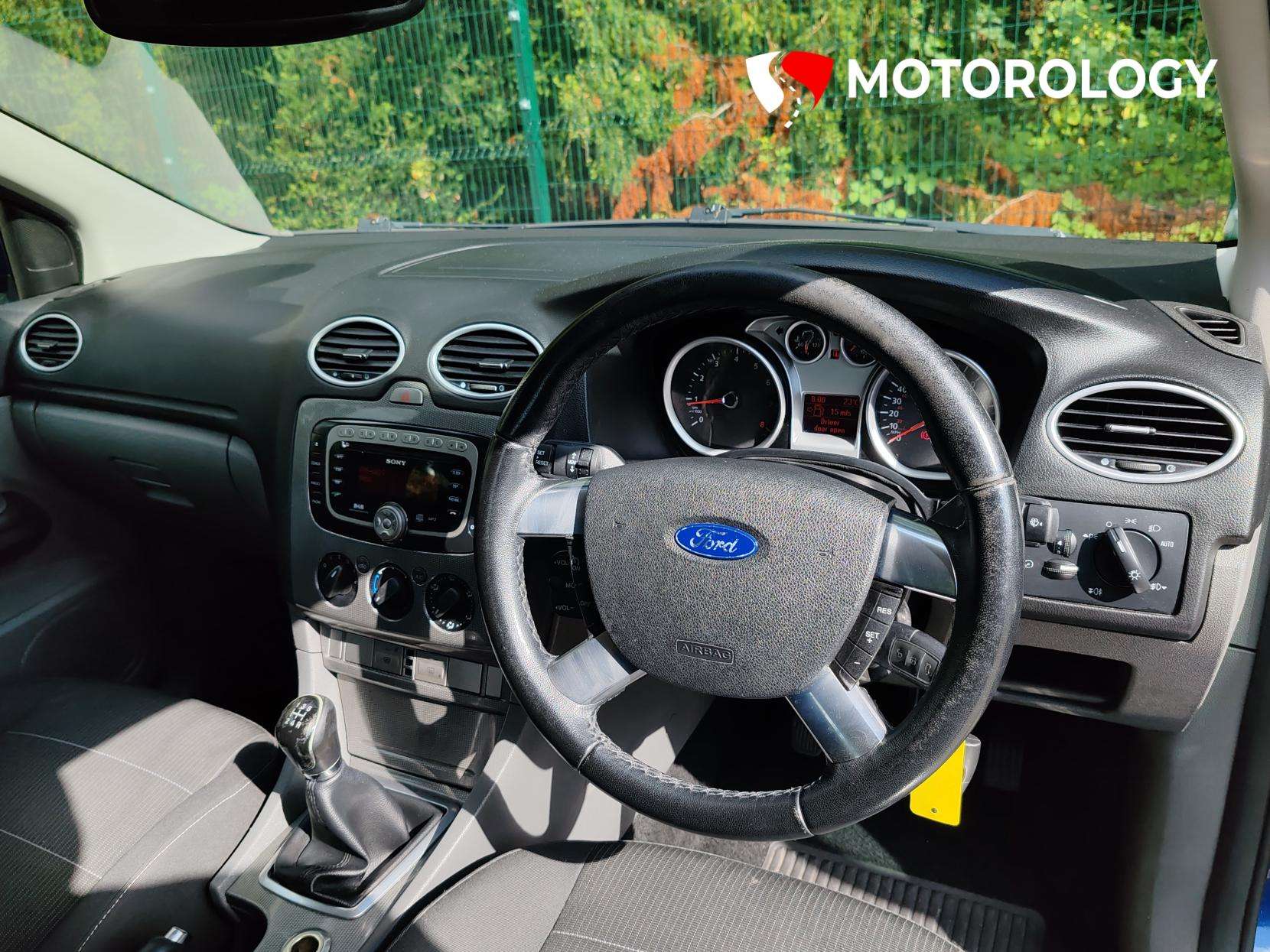 A 2009 FORD FOCUS 1.6 Titanium Hatchback 5dr Petrol Manual (159 g/km, 99 bhp) A 2009 FORD FOCUS 1.6 Titanium Hatchback 5dr Petrol Manual (159 g/km, 99 bhp)