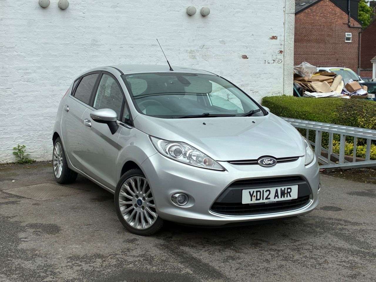 A 2012 FORD FIESTA 1.4 Titanium Hatchback 5dr Petrol Manual (133 g/km, 94 bhp) VERY LOW MILEAG A 2012 FORD FIESTA 1.4 Titanium Hatchback 5dr Petrol Manual (133 g/km, 94 bhp) VERY LOW MILEAG