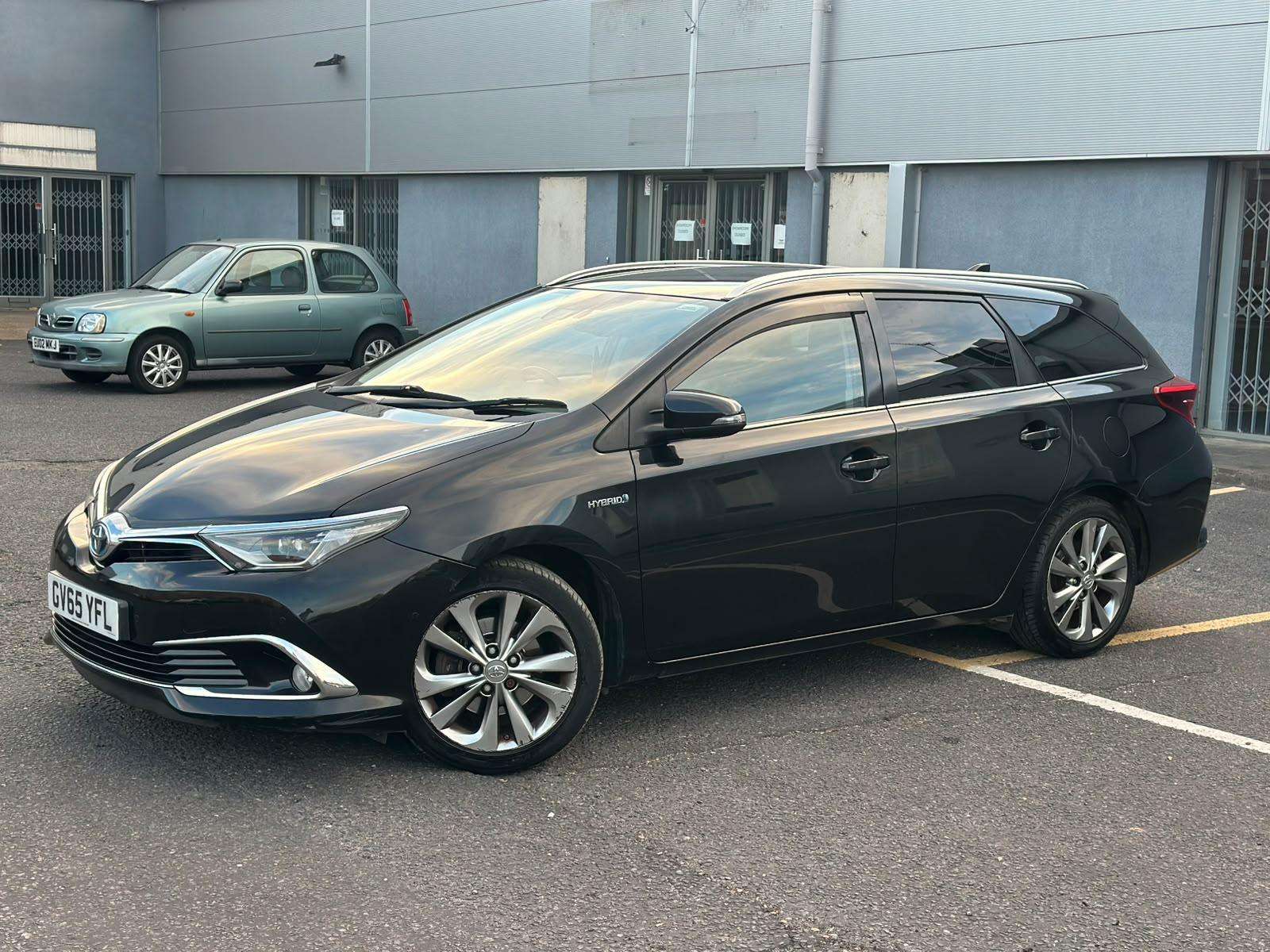 A 2015 TOYOTA AURIS 1.8 VVT-h Excel Touring Sports 5dr Petrol Hybrid CVT Euro 6 (s/s) (Safety Sense) (136 ps) A 2015 TOYOTA AURIS 1.8 VVT-h Excel Touring Sports 5dr Petrol Hybrid CVT Euro 6 (s/s) (Safety Sense) (136 ps)