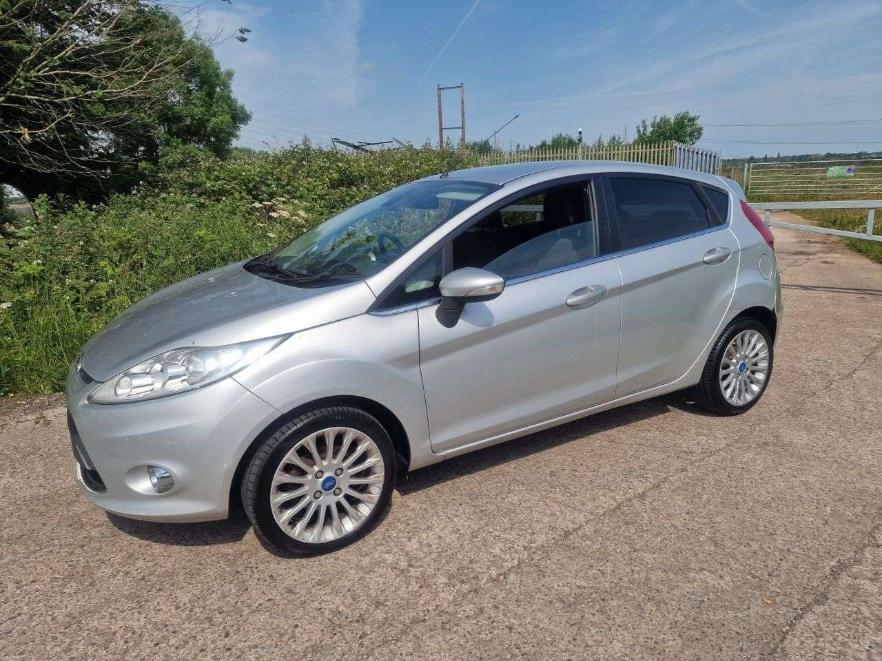 A 2011 FORD FIESTA 1.4 TDCi DPF Titanium Hatchback 5dr Diesel Manual (107 g/km, 69 bhp) A 2011 FORD FIESTA 1.4 TDCi DPF Titanium Hatchback 5dr Diesel Manual (107 g/km, 69 bhp)