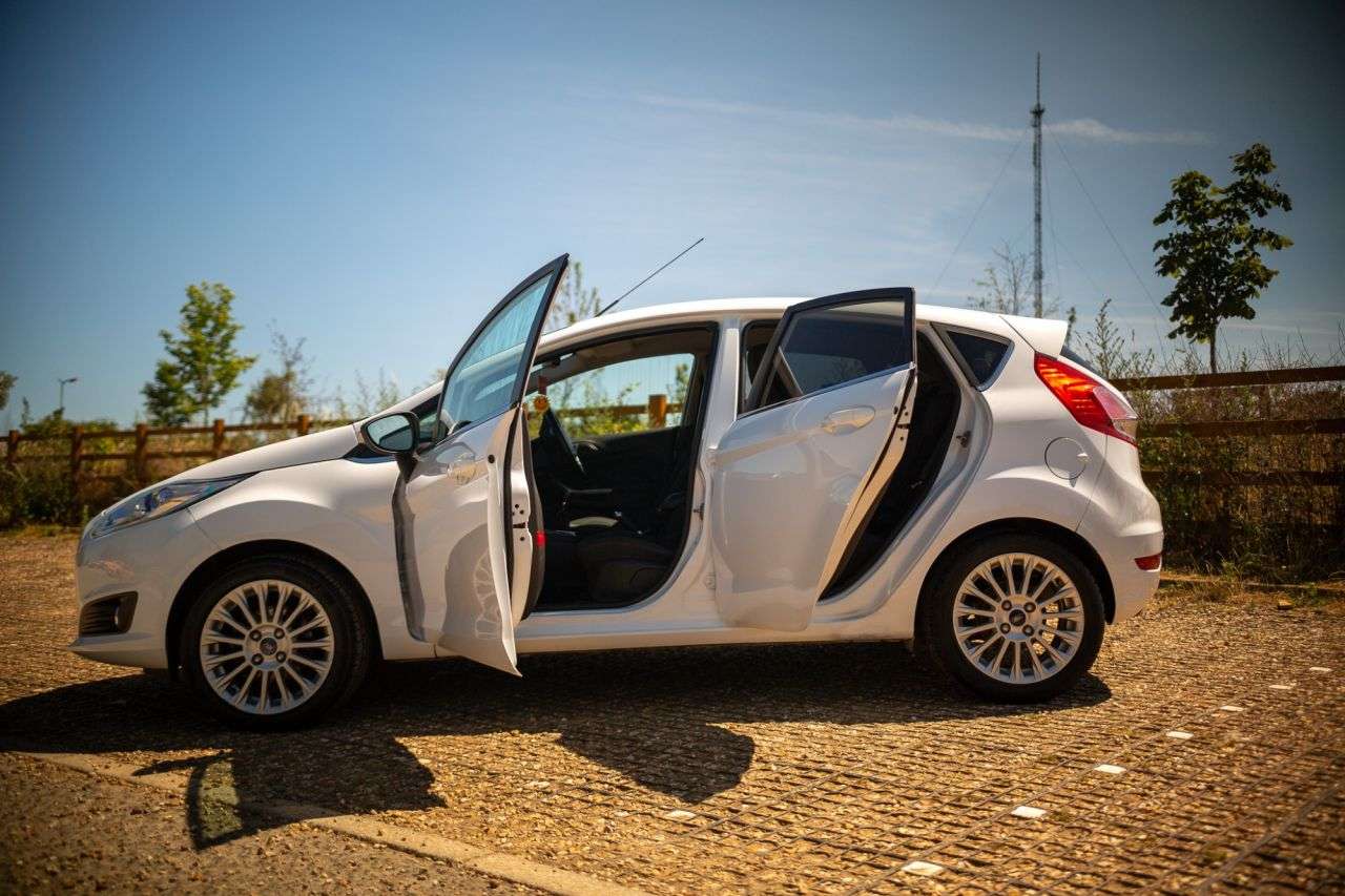 A 2013 FORD FIESTA 1.5 TDCi Titanium Hatchback 5dr Diesel Manual Euro 5 (75 ps) 2 Keys, Rear P A 2013 FORD FIESTA 1.5 TDCi Titanium Hatchback 5dr Diesel Manual Euro 5 (75 ps) 2 Keys, Rear P