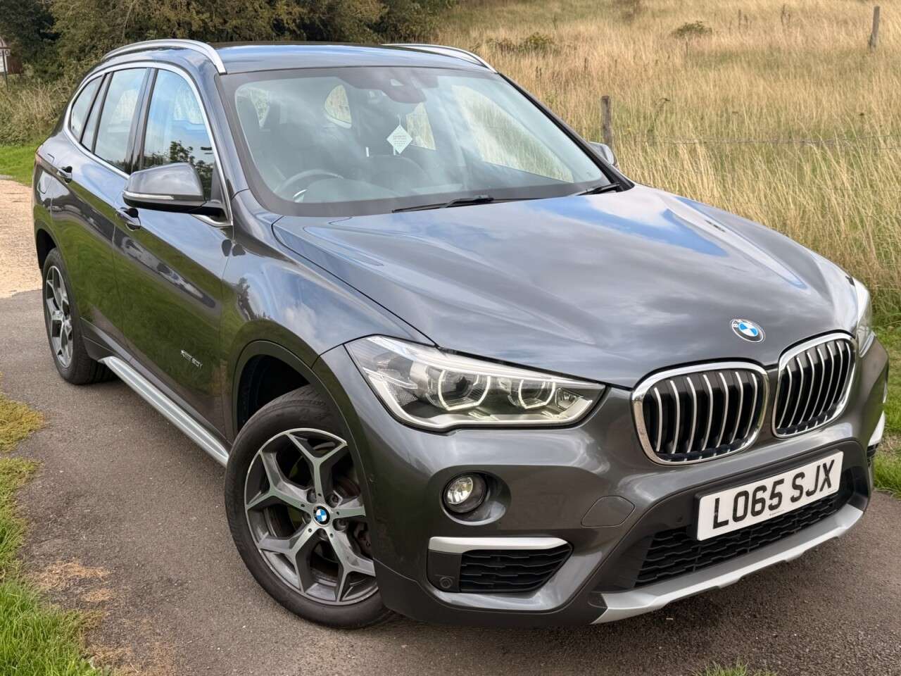 A 2015 BMW X1 2.0 20i xLine SUV 5dr Petrol Auto xDrive Euro 6 (s/s) (192 ps) MINERAL GREY A 2015 BMW X1 2.0 20i xLine SUV 5dr Petrol Auto xDrive Euro 6 (s/s) (192 ps) MINERAL GREY