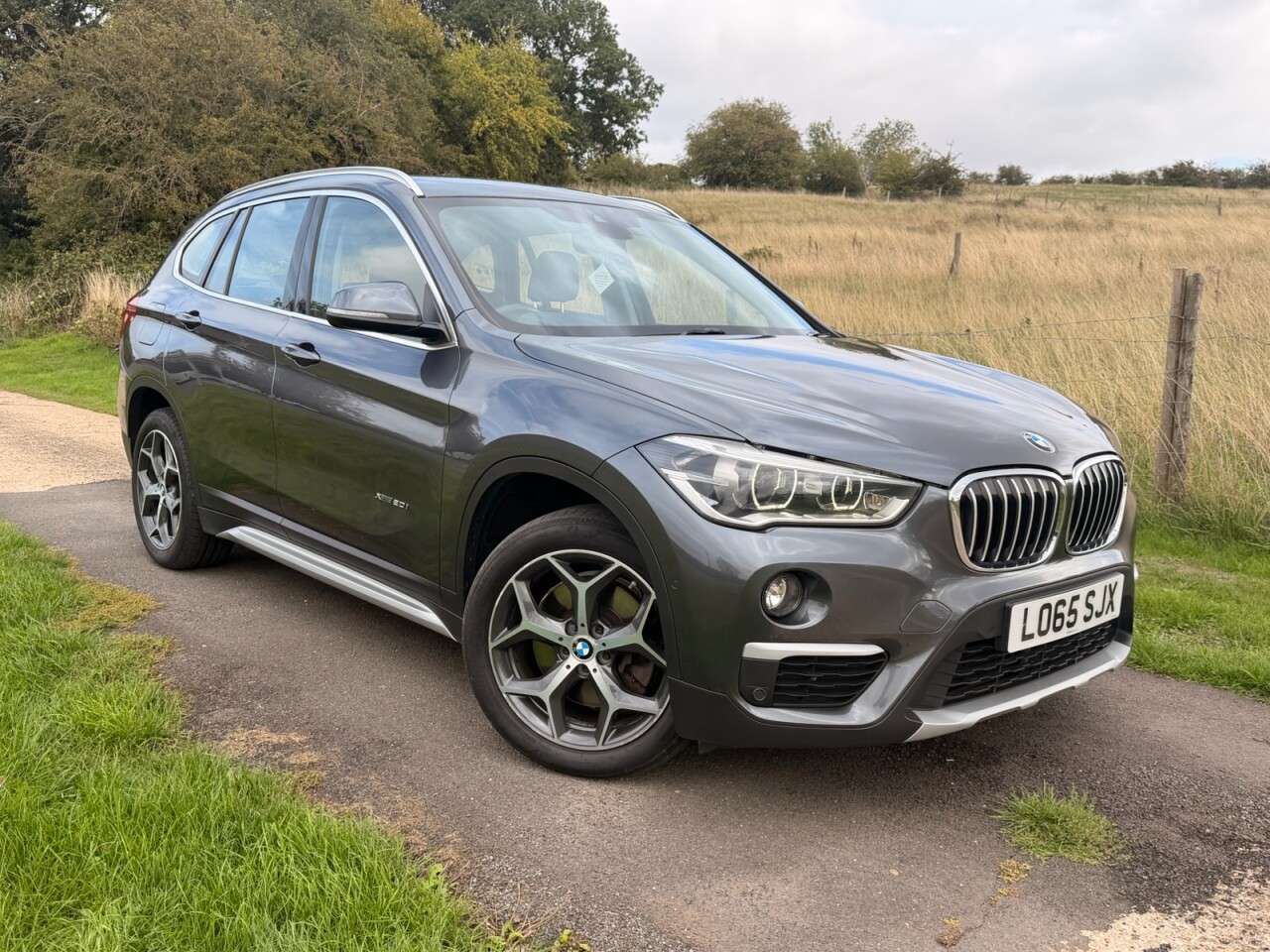 A 2015 BMW X1 2.0 20i xLine SUV 5dr Petrol Auto xDrive Euro 6 (s/s) (192 ps) MINERAL GREY A 2015 BMW X1 2.0 20i xLine SUV 5dr Petrol Auto xDrive Euro 6 (s/s) (192 ps) MINERAL GREY