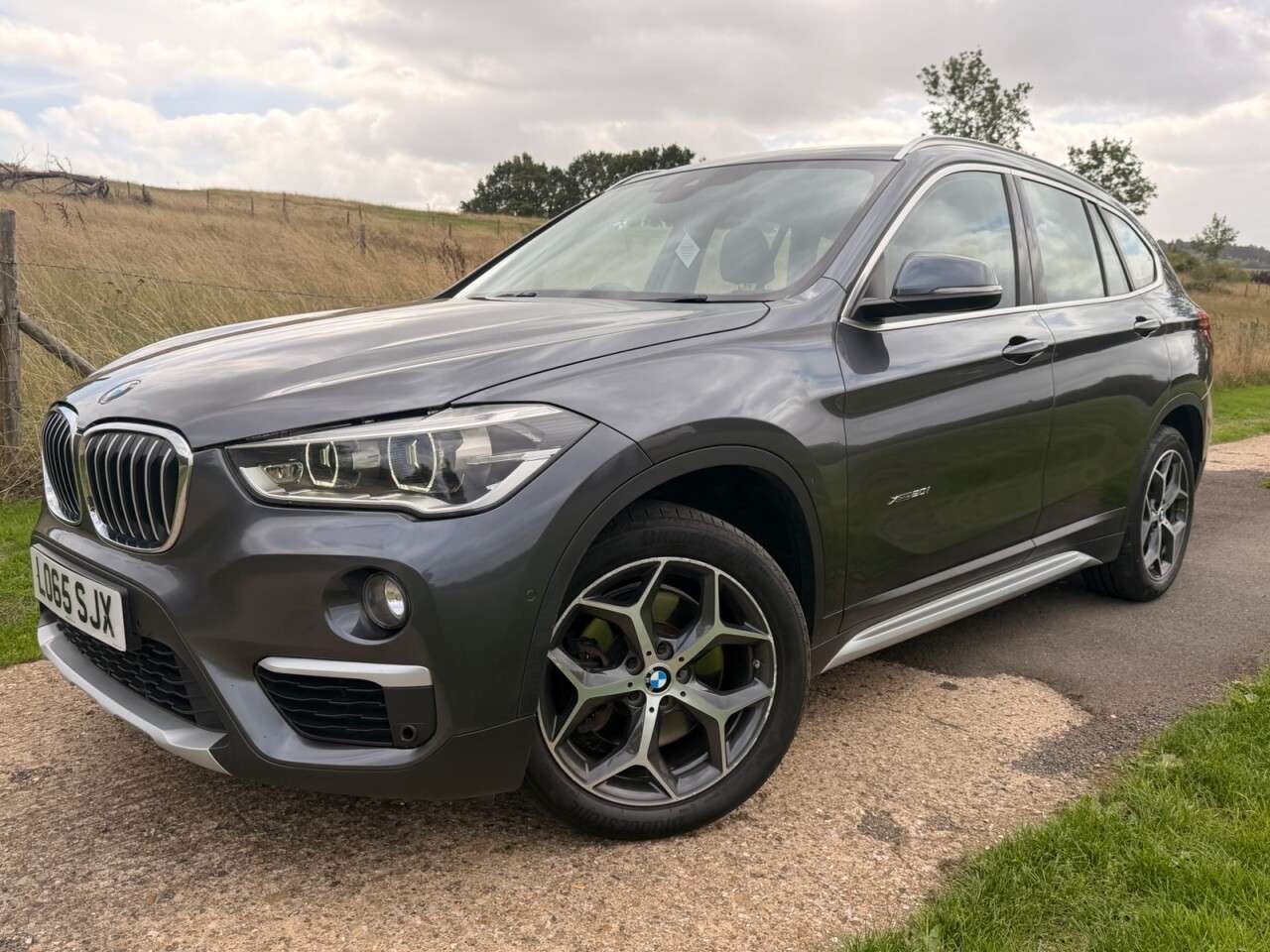 A 2015 BMW X1 2.0 20i xLine SUV 5dr Petrol Auto xDrive Euro 6 (s/s) (192 ps) MINERAL GREY A 2015 BMW X1 2.0 20i xLine SUV 5dr Petrol Auto xDrive Euro 6 (s/s) (192 ps) MINERAL GREY