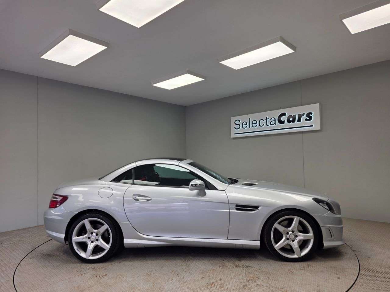 A 2016 MERCEDES-BENZ SLK 2.0 SLK200 AMG Sport Convertible 2dr Petrol G-Tronic Euro 6 (s/s) (184 ps) A 2016 MERCEDES-BENZ SLK 2.0 SLK200 AMG Sport Convertible 2dr Petrol G-Tronic Euro 6 (s/s) (184 ps)