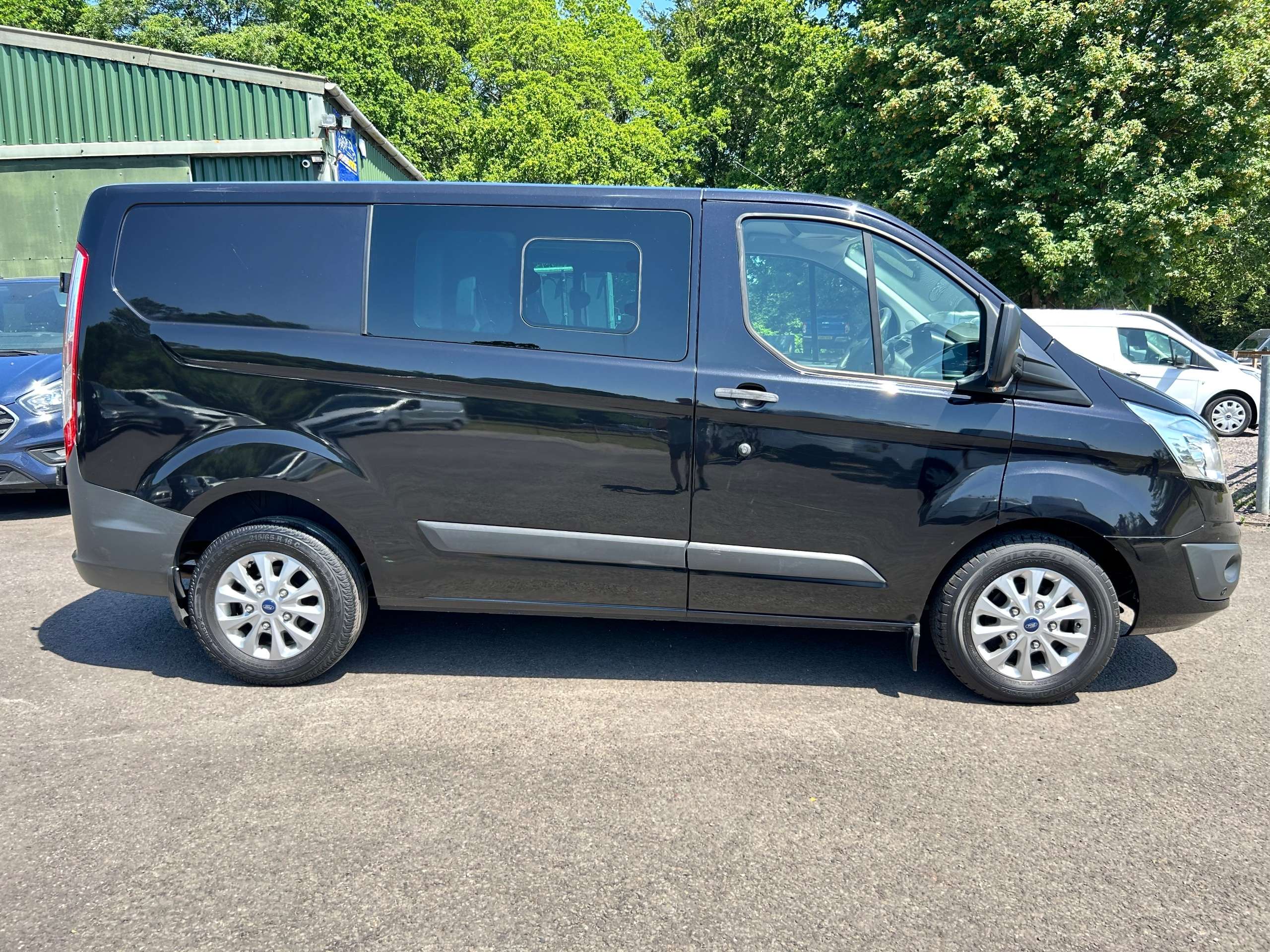 A 2014 FORD TRANSIT CUSTOM 2.2 TDCi 270 Trend Combi Van 5dr Diesel Manual L1 H1 (191 g/km, 123 bhp) A 2014 FORD TRANSIT CUSTOM 2.2 TDCi 270 Trend Combi Van 5dr Diesel Manual L1 H1 (191 g/km, 123 bhp)