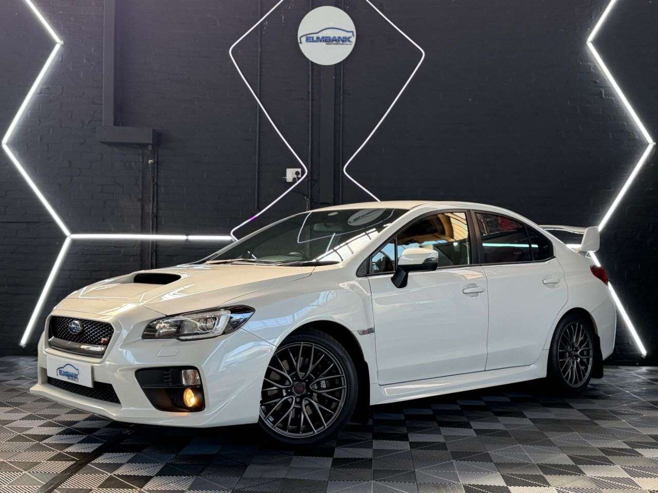 A 2014 SUBARU WRX STI 2.5T Type UK Saloon 4dr Petrol Manual 4WD Euro 6 (300 ps) CRYSTAL WHITE PEA A 2014 SUBARU WRX STI 2.5T Type UK Saloon 4dr Petrol Manual 4WD Euro 6 (300 ps) CRYSTAL WHITE PEA