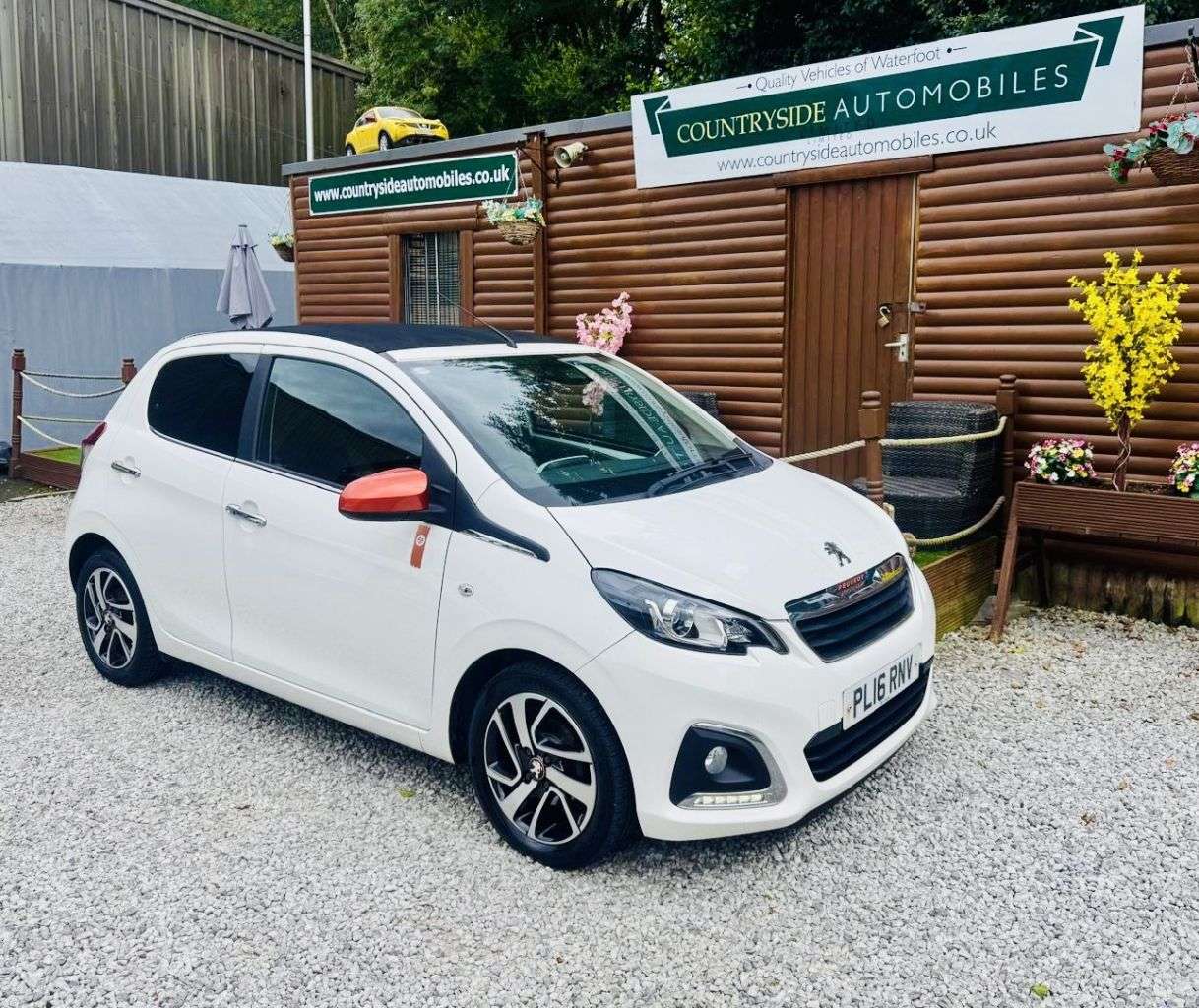 A 2016 PEUGEOT 108 1.2 PureTech Roland Garros Top! 5dr Petrol Manual Euro 6 (82 ps) OPEN TOP & A 2016 PEUGEOT 108 1.2 PureTech Roland Garros Top! 5dr Petrol Manual Euro 6 (82 ps) OPEN TOP &