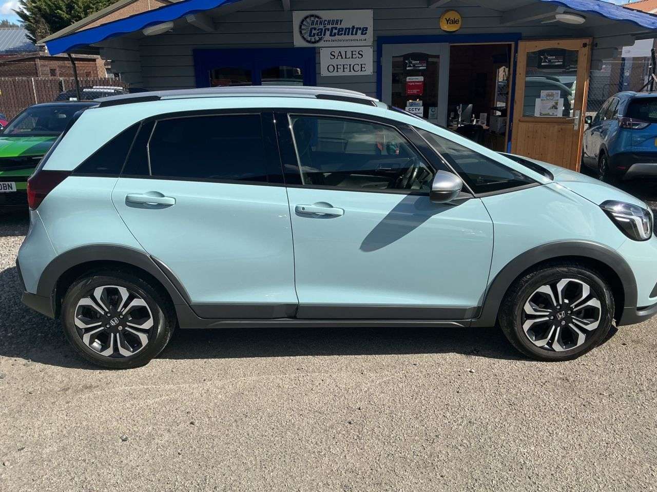 A 2021 HONDA JAZZ 1.5 h i-MMD Crosstar EX Hatchback 5dr Petrol Hybrid eCVT Euro 6 (s/s) (107 A 2021 HONDA JAZZ 1.5 h i-MMD Crosstar EX Hatchback 5dr Petrol Hybrid eCVT Euro 6 (s/s) (107