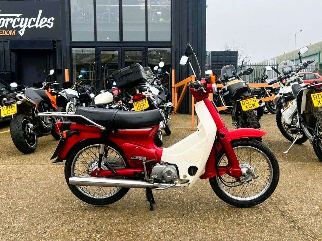A 1995 HONDA C90 - HONDA'S ICONIC STEP-THROUGH — SIMPLE, TOUGH, & BUILT TO LAST ONLY 11,270 A 1995 HONDA C90 - HONDA'S ICONIC STEP-THROUGH — SIMPLE, TOUGH, & BUILT TO LAST ONLY 11,270