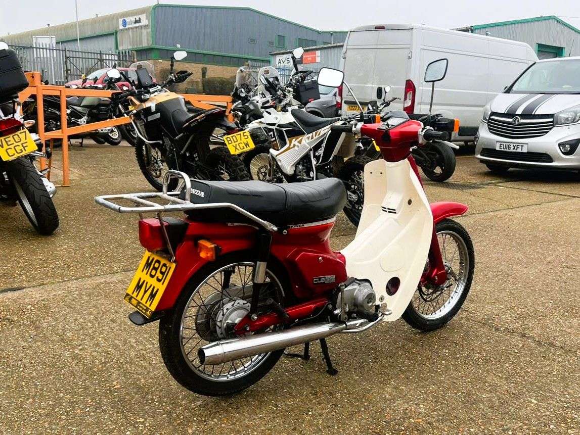 A 1995 HONDA C90 - HONDA'S ICONIC STEP-THROUGH — SIMPLE, TOUGH, & BUILT TO LAST ONLY 11,270 A 1995 HONDA C90 - HONDA'S ICONIC STEP-THROUGH — SIMPLE, TOUGH, & BUILT TO LAST ONLY 11,270