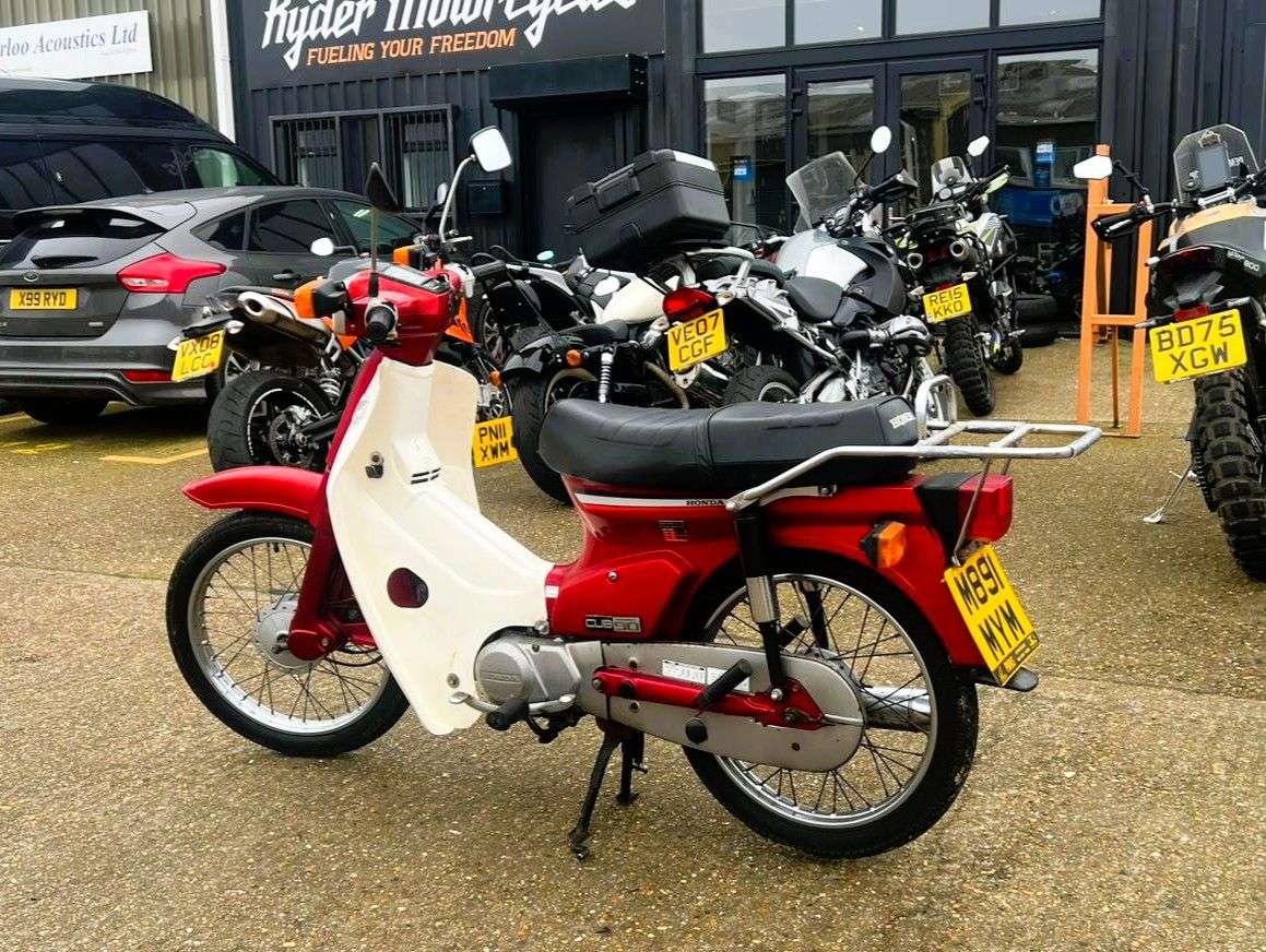 A 1995 HONDA C90 - HONDA'S ICONIC STEP-THROUGH — SIMPLE, TOUGH, & BUILT TO LAST ONLY 11,270 A 1995 HONDA C90 - HONDA'S ICONIC STEP-THROUGH — SIMPLE, TOUGH, & BUILT TO LAST ONLY 11,270